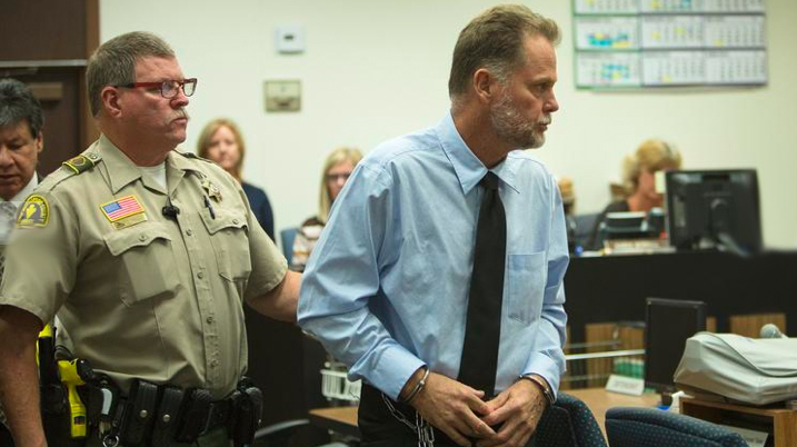 Charles Merritt was led out of the courtroom after his arraignment, where he pleaded not guilty in the slayings of the McStay family. (Credit: Los Angeles Times)