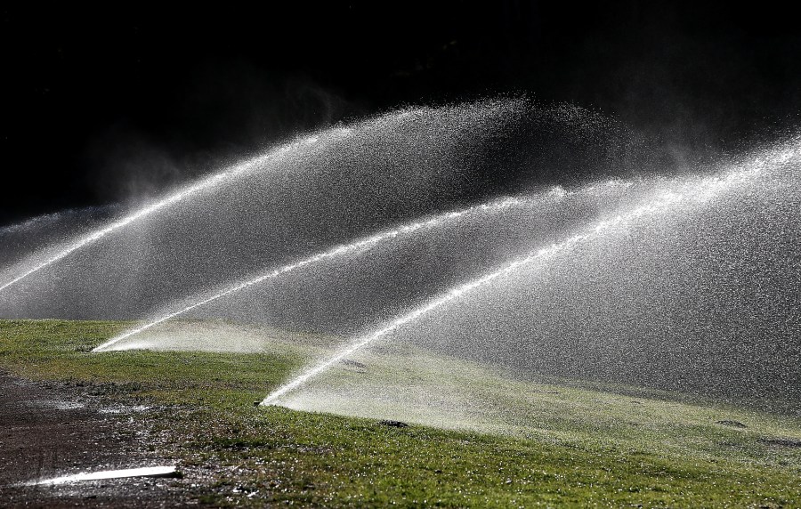 A file photo shows sprinklers watering the lawn in Golden Gate Park on April 2, 2015 in San Francisco. (Justin Sullivan/Getty Images)