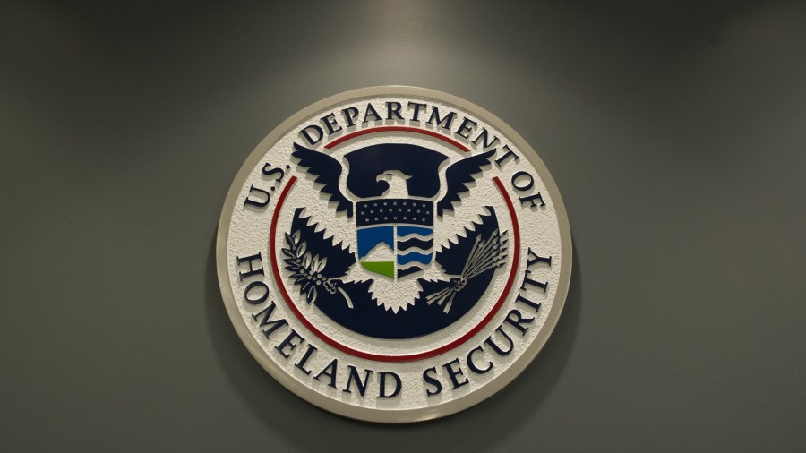 The logo of the Department of Homeland Security is seen at US Immigration and Customs Enforcement in Washington, DC, February 25, 2015. (Credit: SAUL LOEB/AFP/Getty Images)