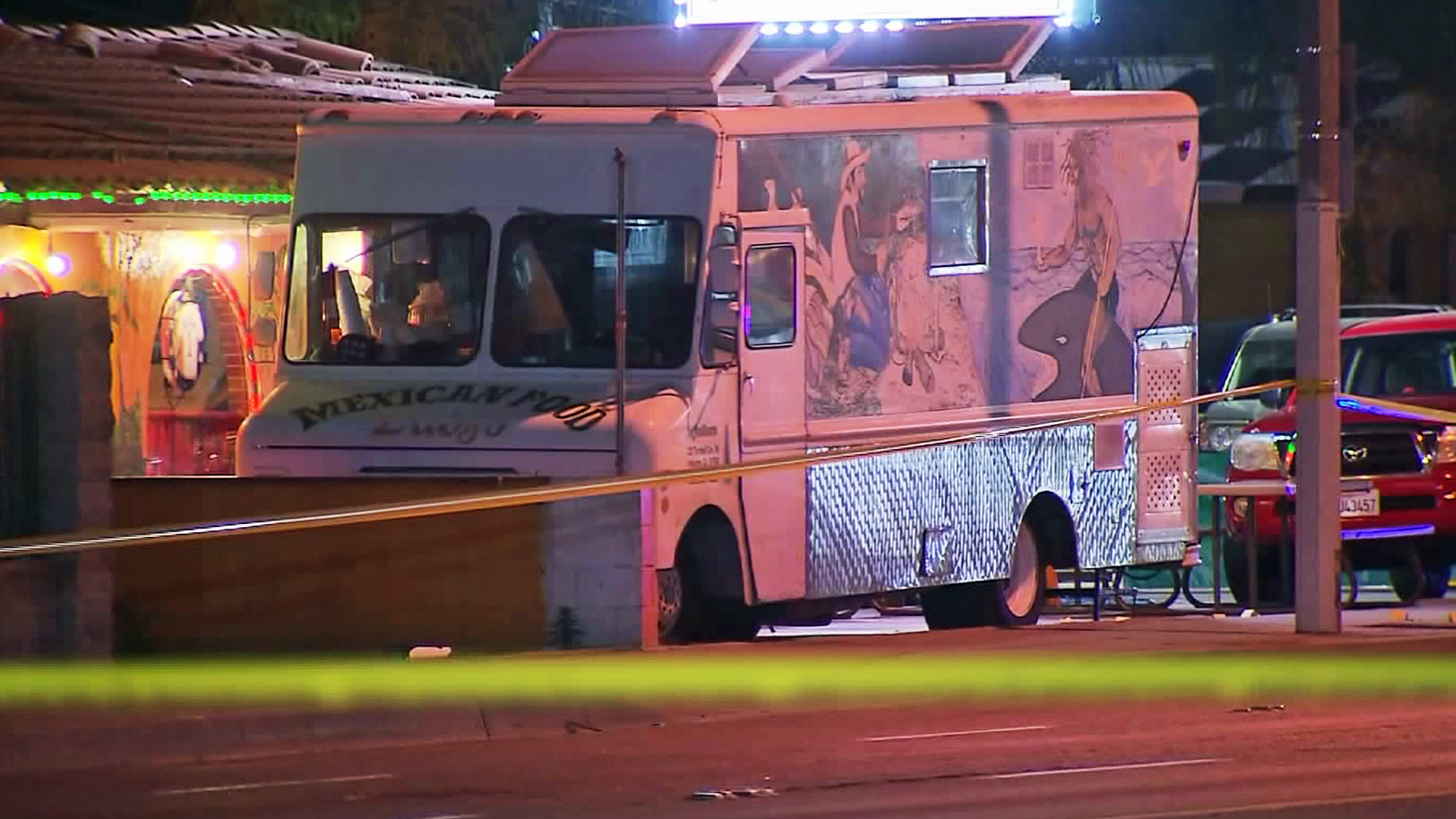 A taco truck is seen in the parking lot where a fatal shootout took place in Bassett on April 19, 2016. (Credit: KTLA)