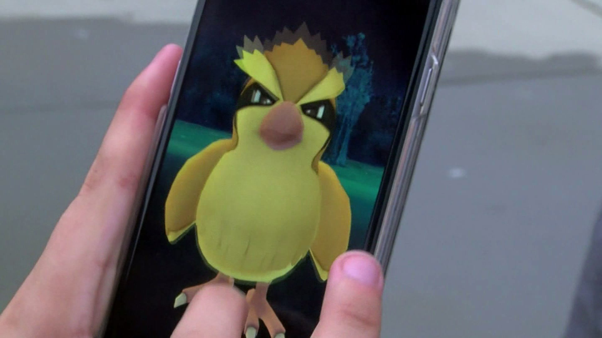 In this file photo, a smartphone user is seen playing "Pokemon Go." (Credit: KTLA)