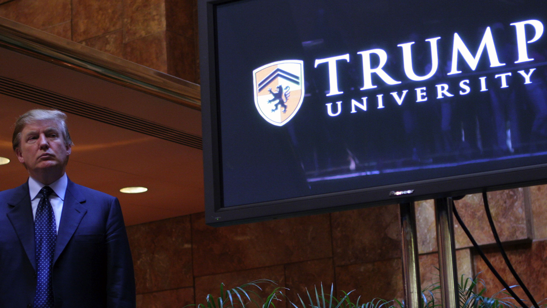 Donald Trump holds a media conference announcing the establishment of Trump University May 23, 2005 in New York City. (Credit: Thos Robinson/Getty Images)