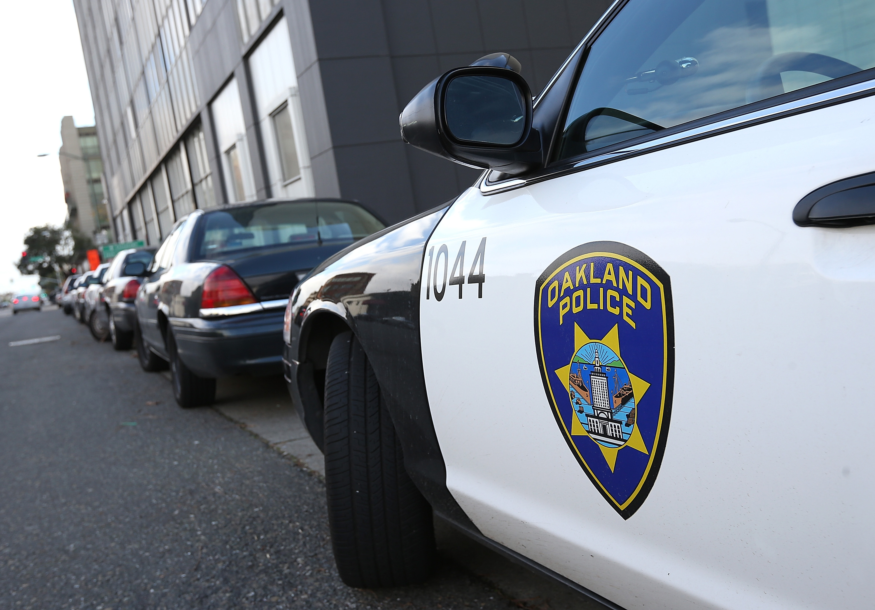 An Oakland Police patrol car sits in front of the Oakland Police headquarters on Dec. 6, 2012. (Credit: Justin Sullivan / Getty Images)