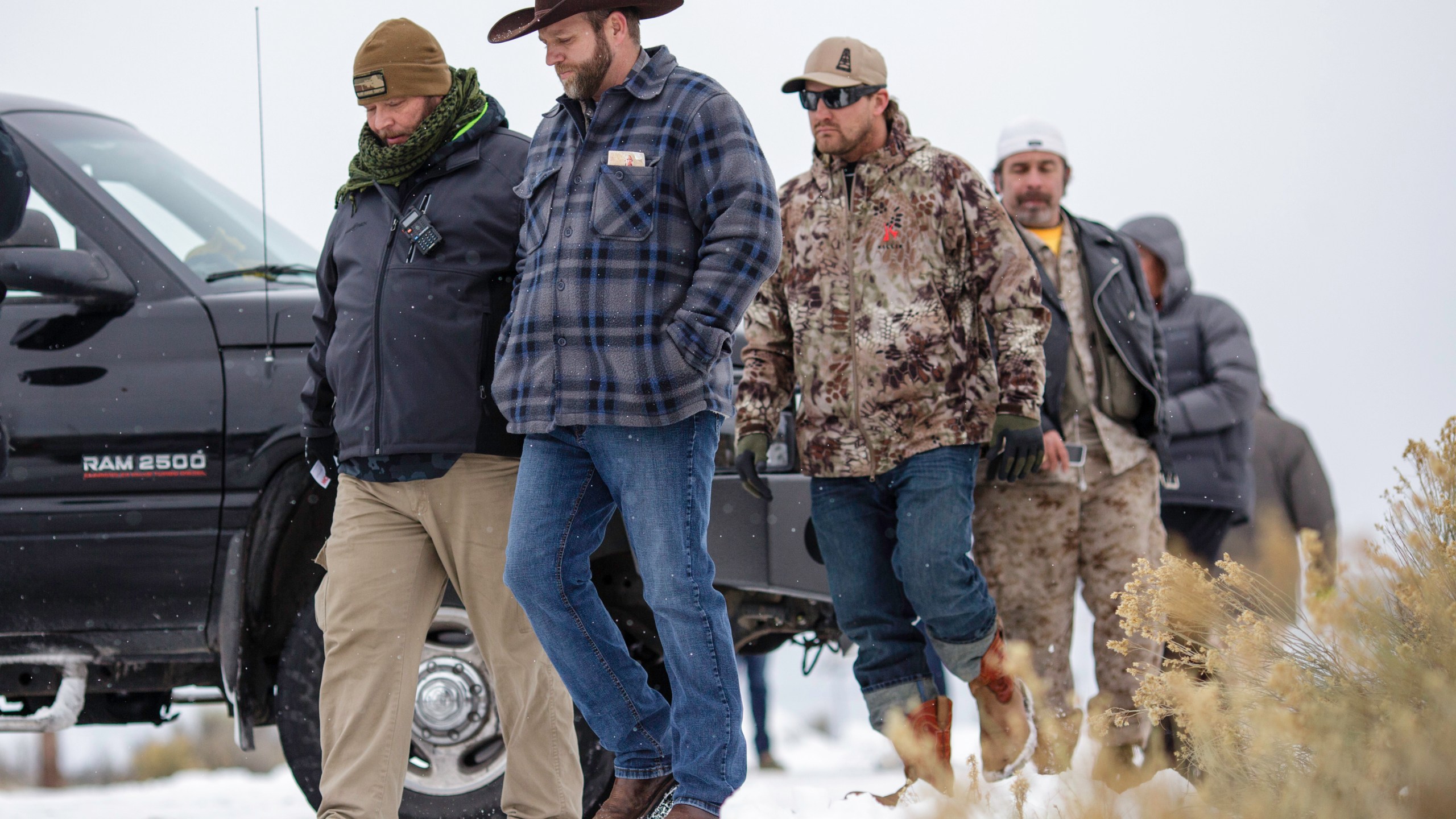 Ammon Bundy, in front, leader of an armed anti-government militia, returns to the Malheur National Wildlife Refuge Headquarters near Burns, Oregon Jan. 5, 2016, following a news conference. (Rob Kerr/AFP/Getty Images)