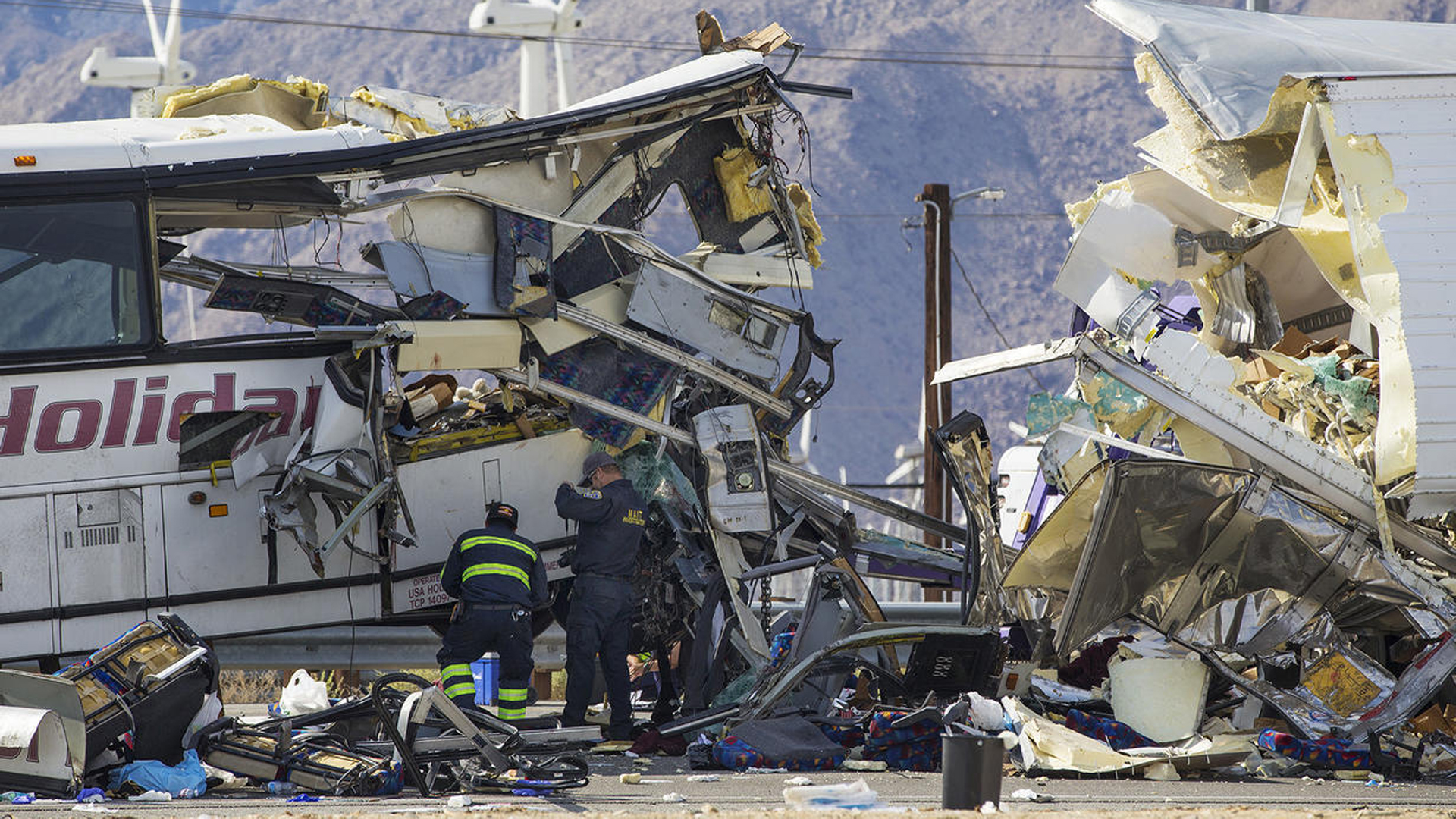 Authorities said 13 people were killed and 31 injured Oct. 23, 2016, morning when a tour bus crashed into the back of a big rig near Palm Springs. (Credit: Gina Ferazzi / Los Angeles Times)