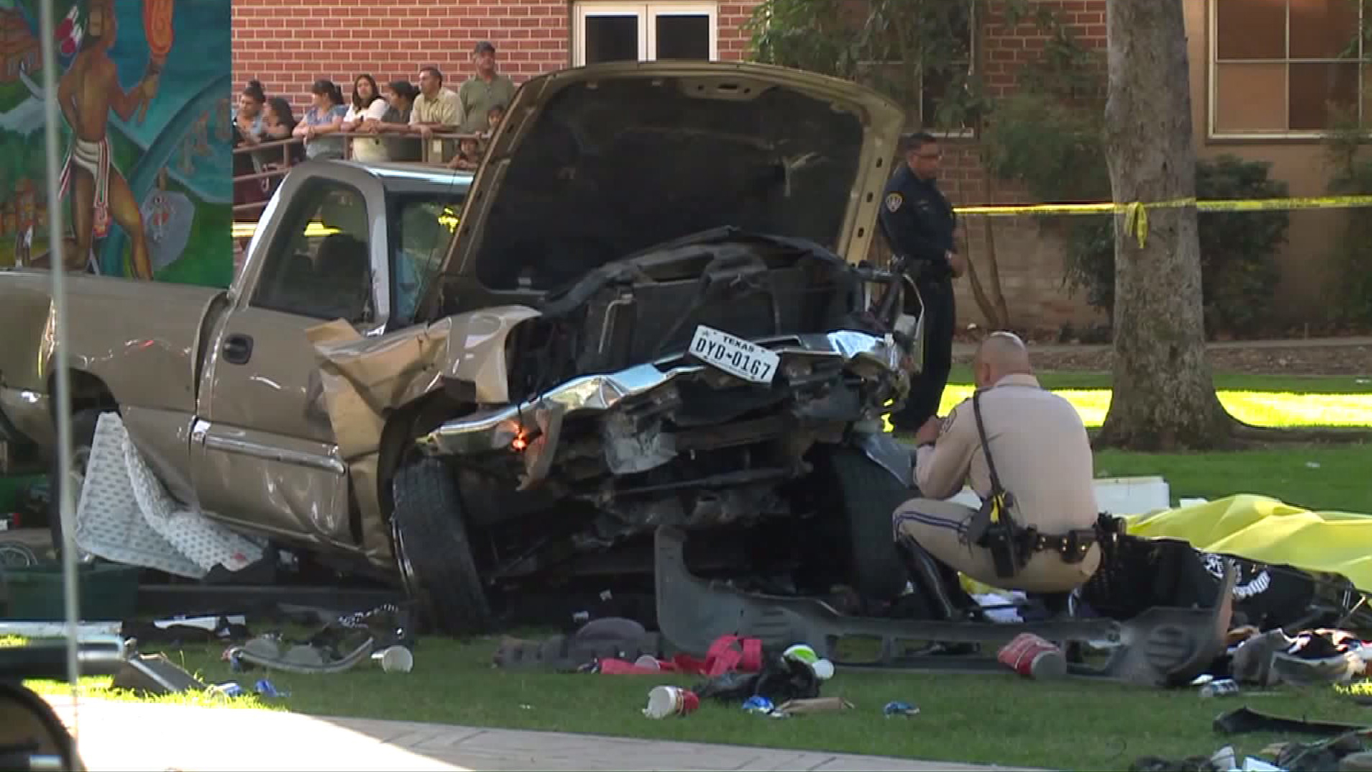 The pickup driven by a Navy technician landed at Chicano Park after it flew off a ramp to the San Diego Coronado Bridge, killing four people. (Credit: KTLA)