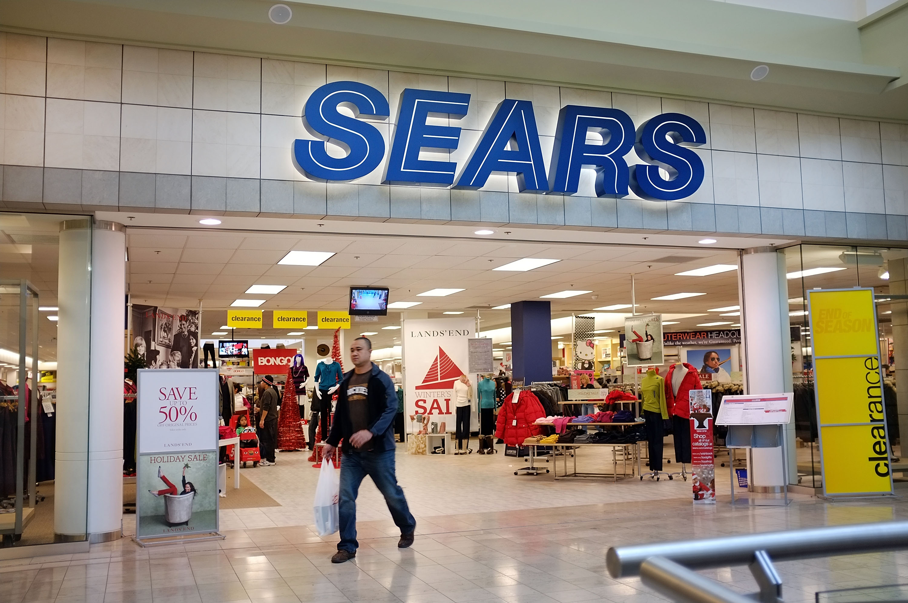 A man walks out of a Sears store on Dec. 27, 2011 in Milford, Connecticut. (Credit: Spencer Platt/Getty Images)