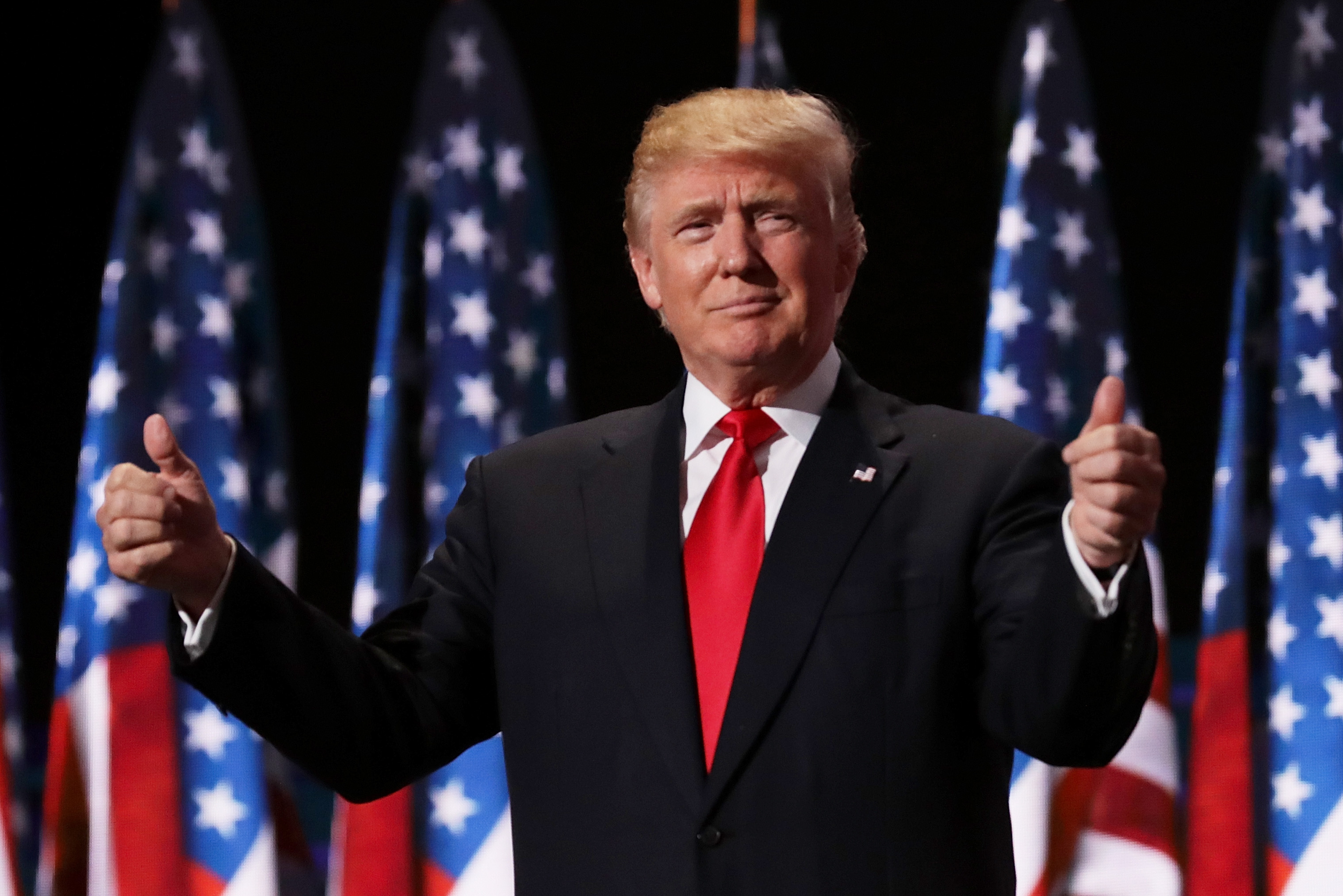 Republican presidential candidate Donald Trump gives two thumbs up to the crowd during the evening session on the fourth day of the Republican National Convention on July 21, 2016 at the Quicken Loans Arena in Cleveland, Ohio. (Credit: Chip Somodevilla/Getty Images)