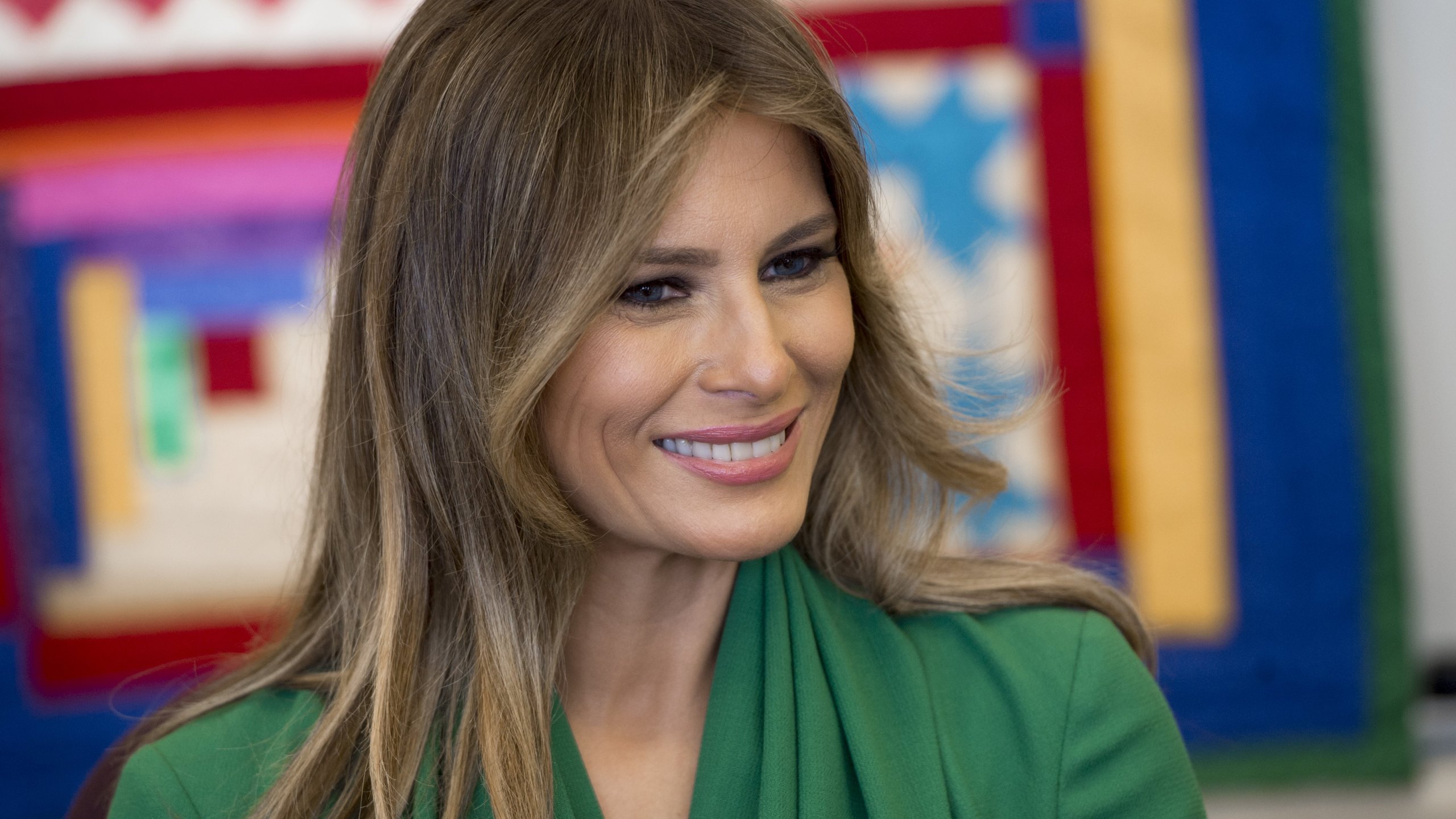 U.S. First Lady Melania Trump talks with students during a visit with Jordan's Queen Rania to the Excel Academy Public Charter School in Washington, D.C, April 5, 2017. (Credit: SAUL LOEB/AFP/Getty Images)