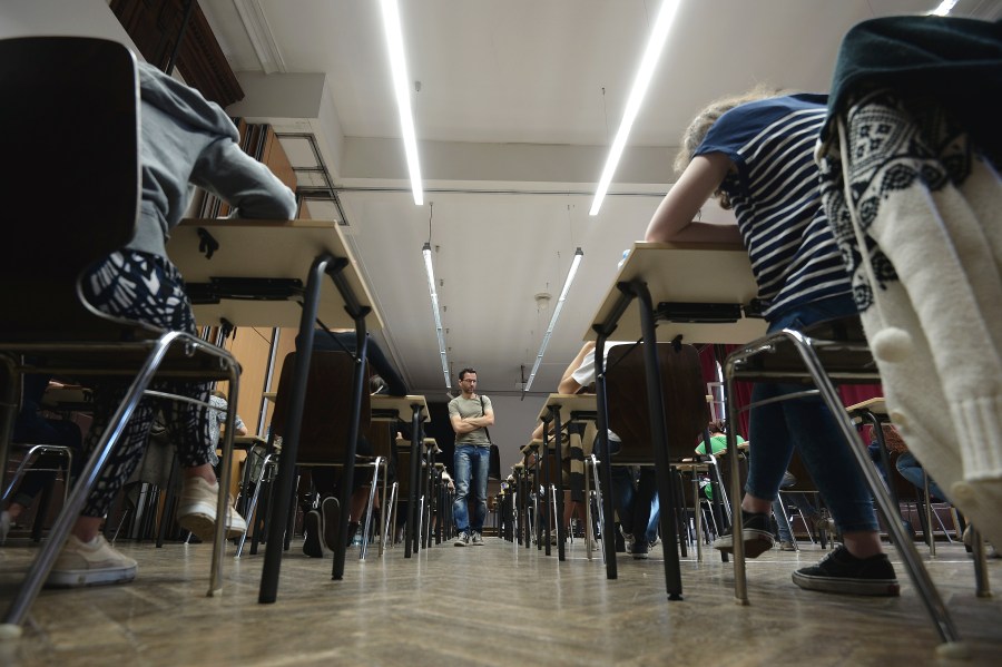 In this file picture taken on June 16, 2014, French students work on the test of philosophy as they take the baccalaureate exam at the Fustel de Coulanges high school in Strasbourg, eastern France. (Credit: FREDERICK FLORIN/AFP/Getty Images)