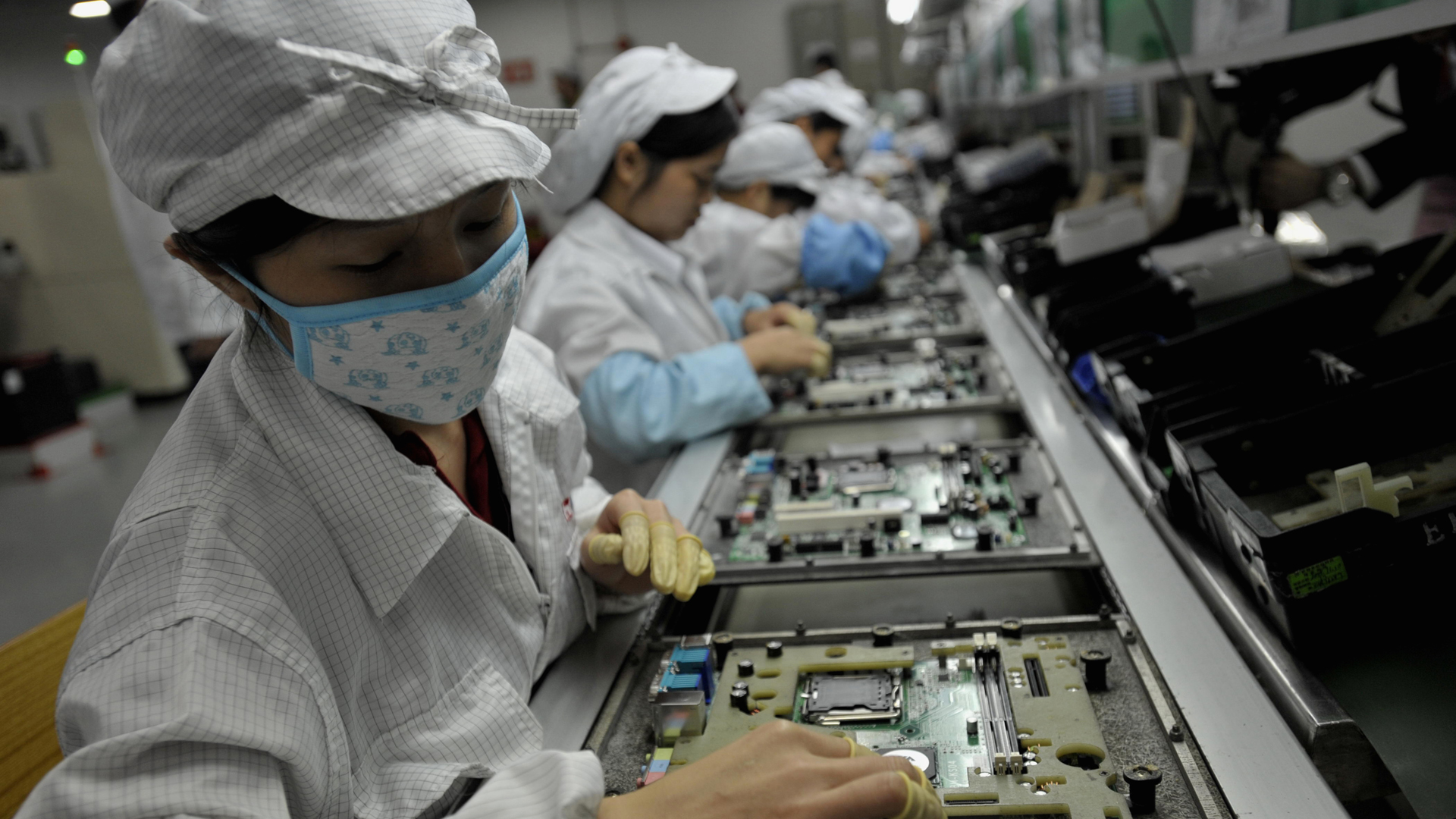 Workers assemble electronics at the Foxconn factory in Shenzhen, China on May 26, 2010. (Credit: AFP/Getty Images)