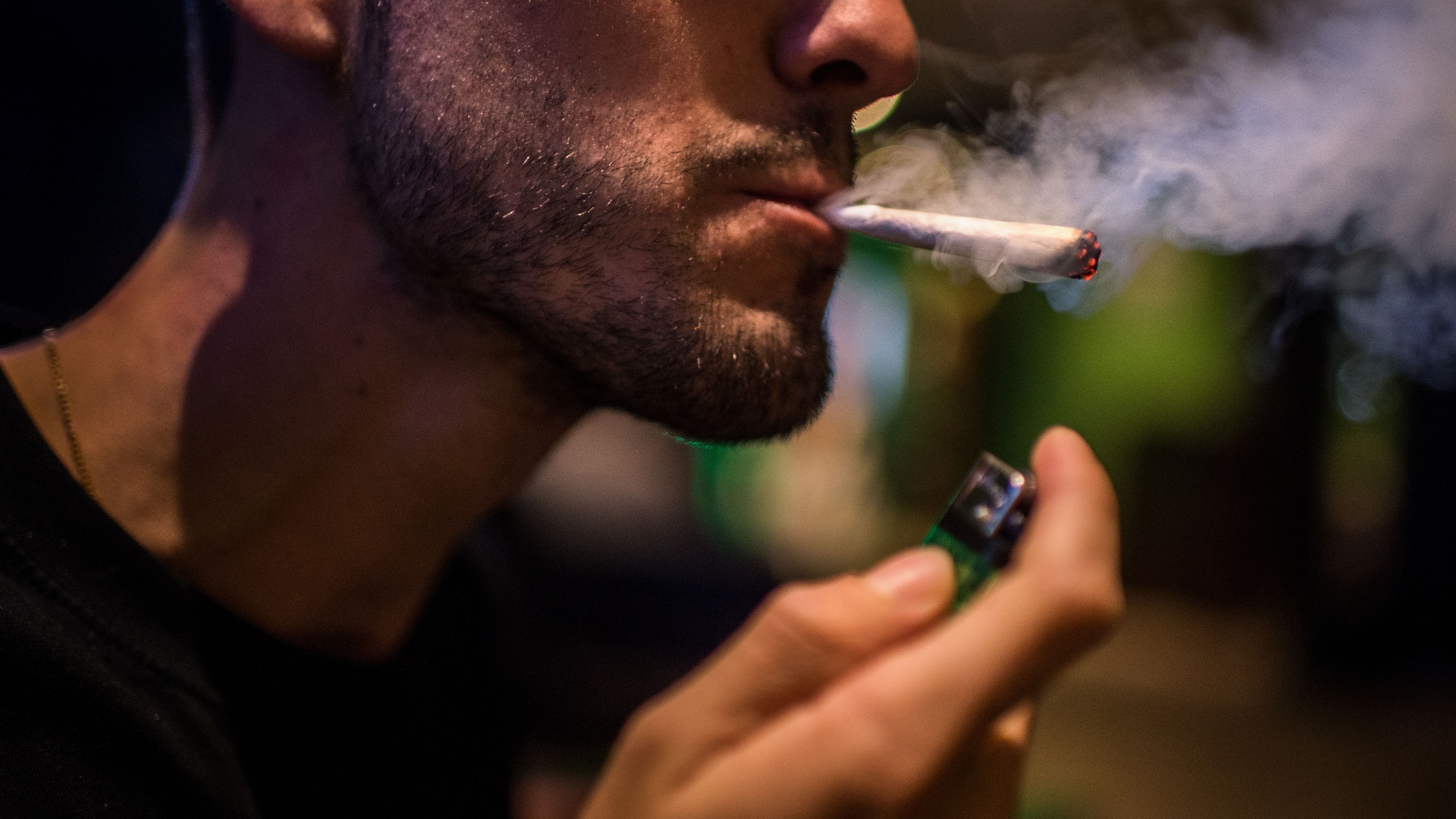 A man smokes a marijuana joint in this file photo. (David Ramos / Getty Images)