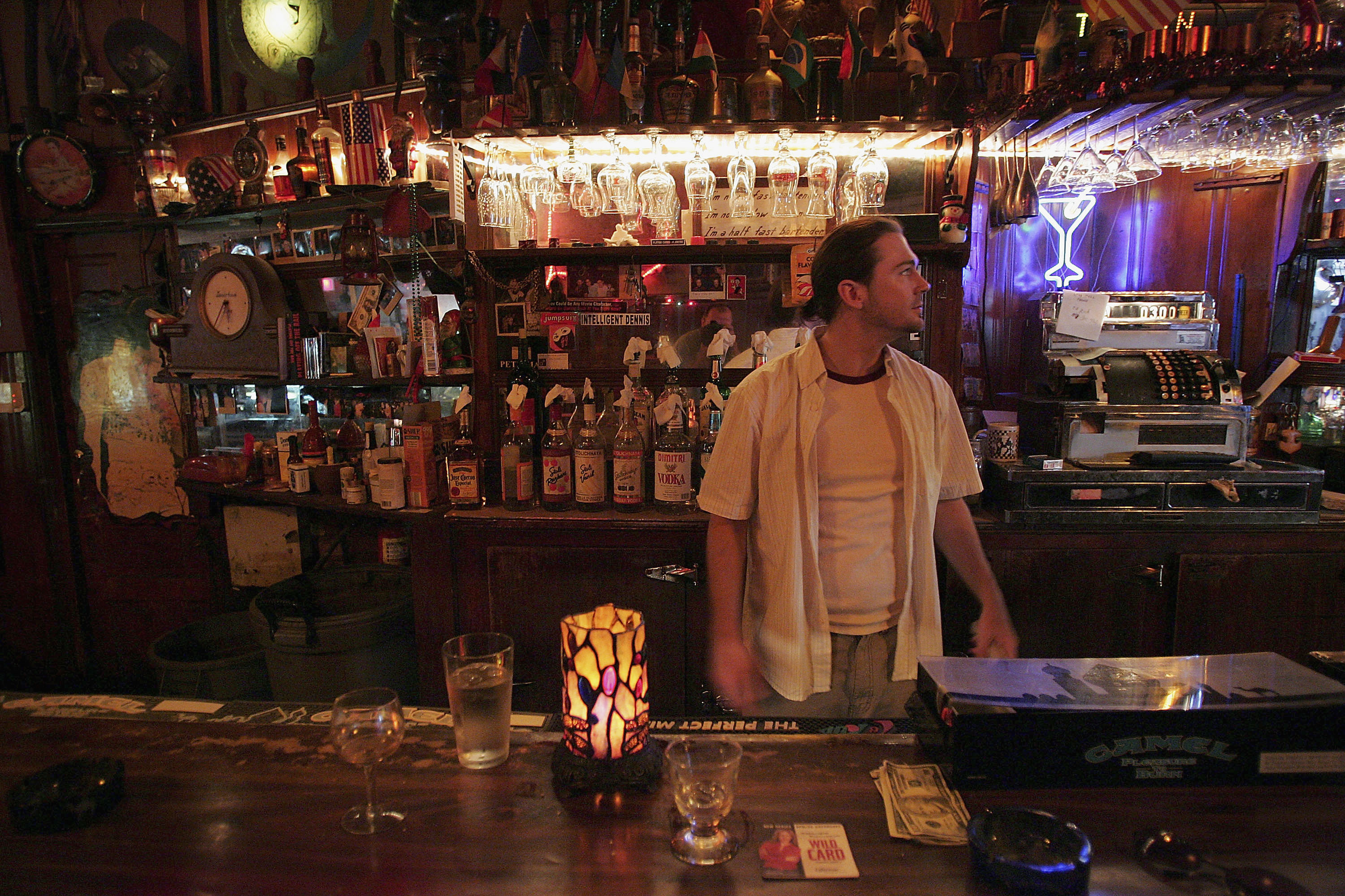 Brandon Pool tends bar at the Inner Town Pub, a corner bar dating back before prohibition in the city's East Village neighborhood June 21, 2005, in Chicago, Illinois. (Credit: Scott Olson / Getty Images)