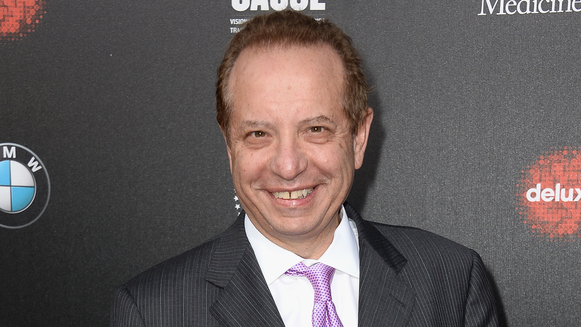 Then-USC Keck School of Medicine Dean Dr. Carmen A. Puliafito arrives at the Second-Annual Rebels With A Cause Gala at Paramount Studios on March 20, 2014, in Hollywood. (Credit: Frazer Harrison/ Getty Images)