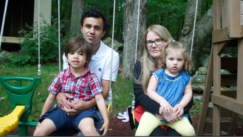 Joel Colindres, from Guatemala, is seen here with his American wife, Samantha, and two children. (Credit: CNN)