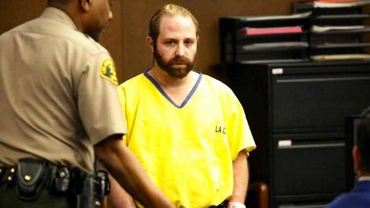 Aramazd Andressian Sr., looks at his estranged wife, Ana Estevez, and other family members earlier this month in an Alhambra courtroom before he pleaded guilty to killing his 5-year-old son. He faces a prison sentence of 25 years to life. (Credit: Al Seib / Los Angeles Times)