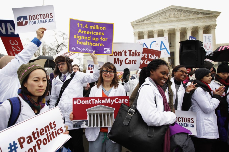 Supporters of the Affordable Care Act gather in front of the U.S Supreme Court during a rally March 4, 2015, in Washington, D.C. (Credit: Alex Wong / Getty Images)