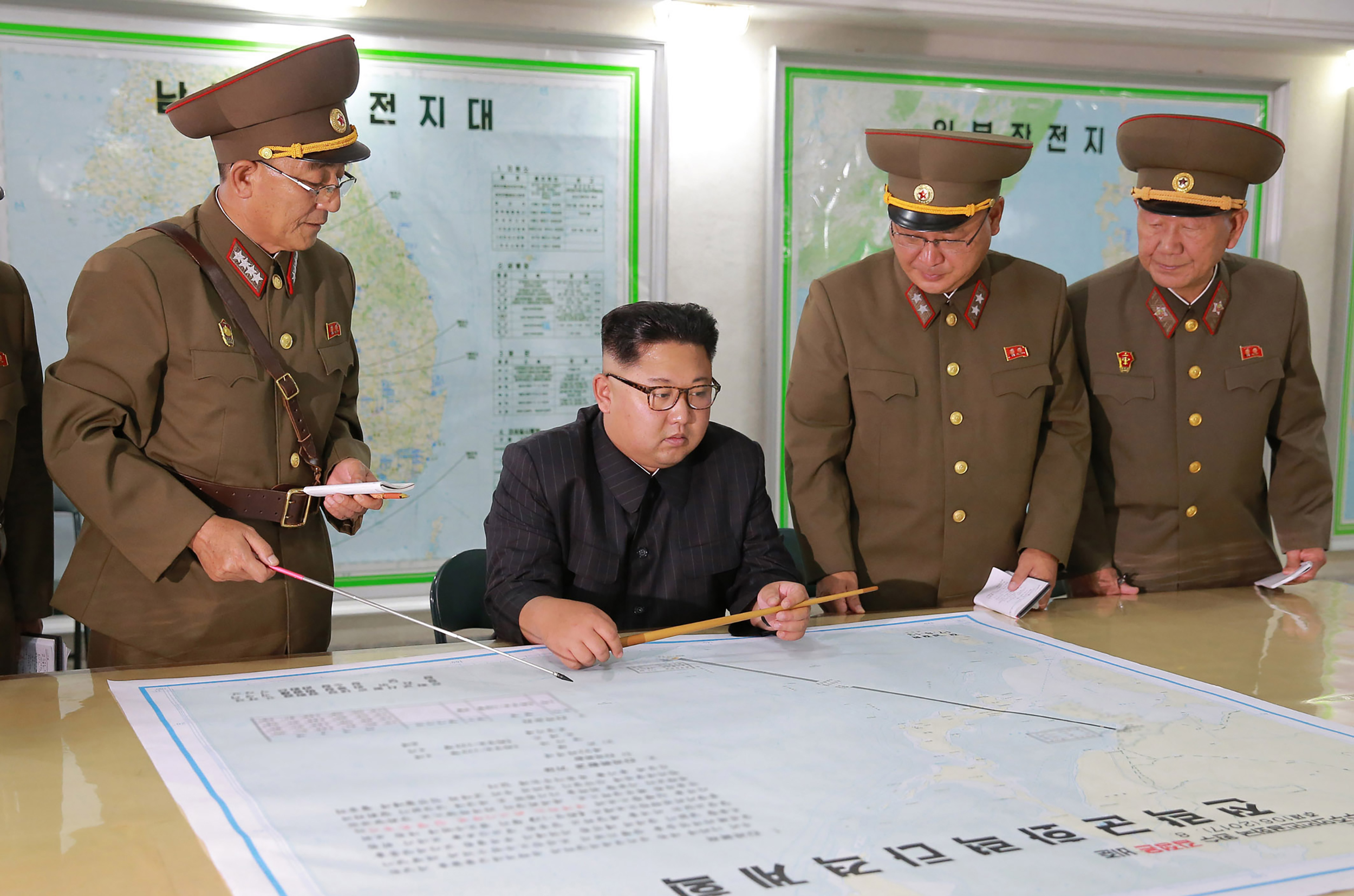 North Korean leader Kim Jong-Un inspects military plans on Aug. 14, 2017. (Credit: Korean Central News Agency via AFP/Getty Images)