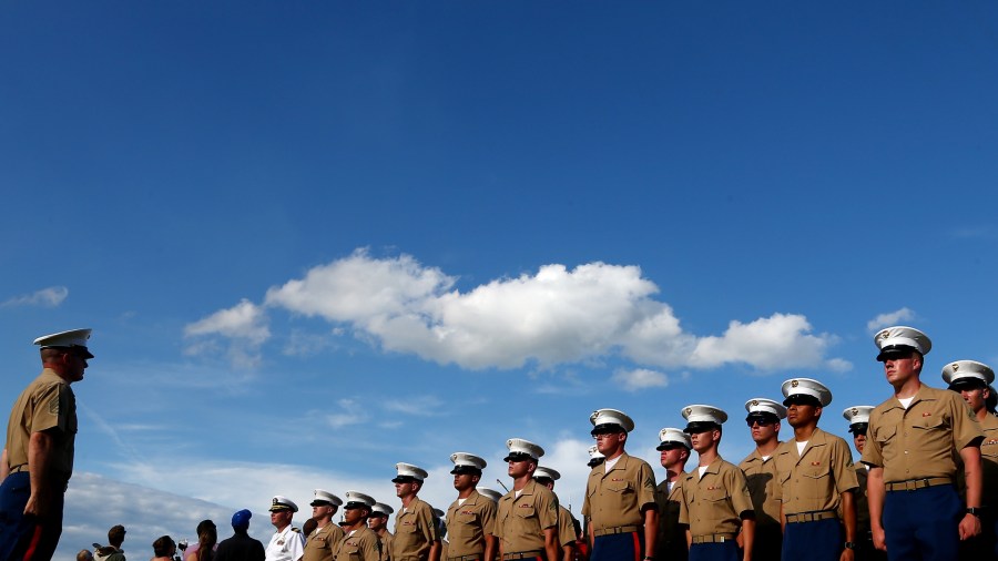 Members of the U.S. Marine Corp stand at attention on May 28, 2017 in Charlotte, North Carolina. (Credit: Sarah Crabill/Getty Images)