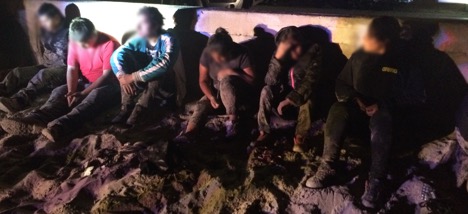 Six people who were detained in San Diego County after officials spotted the boats they were being smuggled on are seen in a photo released by U.S. Customs and Border Protection on Aug. 24, 2017.