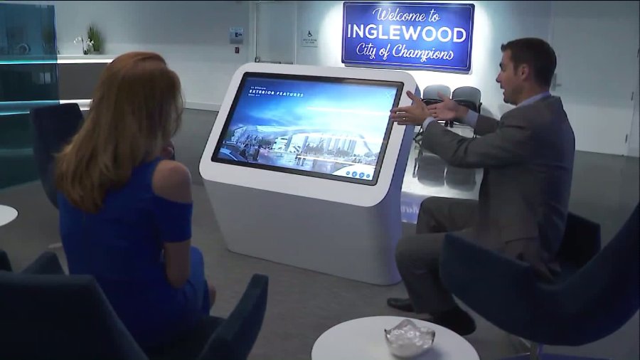 A computer model of the football stadium set to arrive in 2020 is seen at a Playa Vista office. (Credit: KTLA)