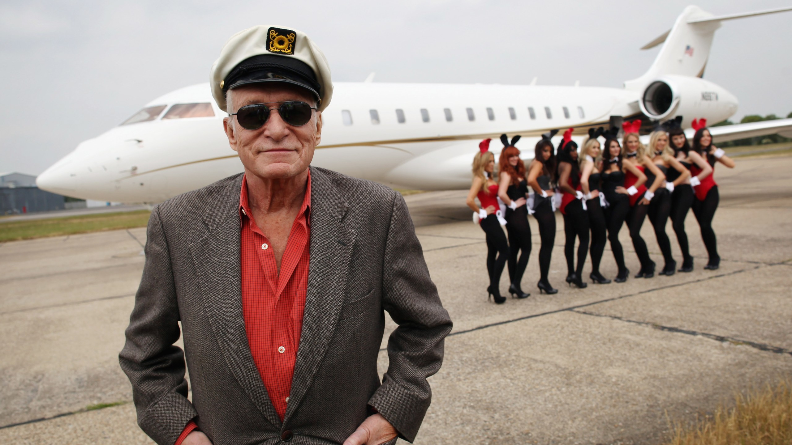 Playboy founder Hugh Hefner arrives at Stansted Airport on June 2, 2011 in Stansted, England. (Credit: an Kitwood/Getty Images)