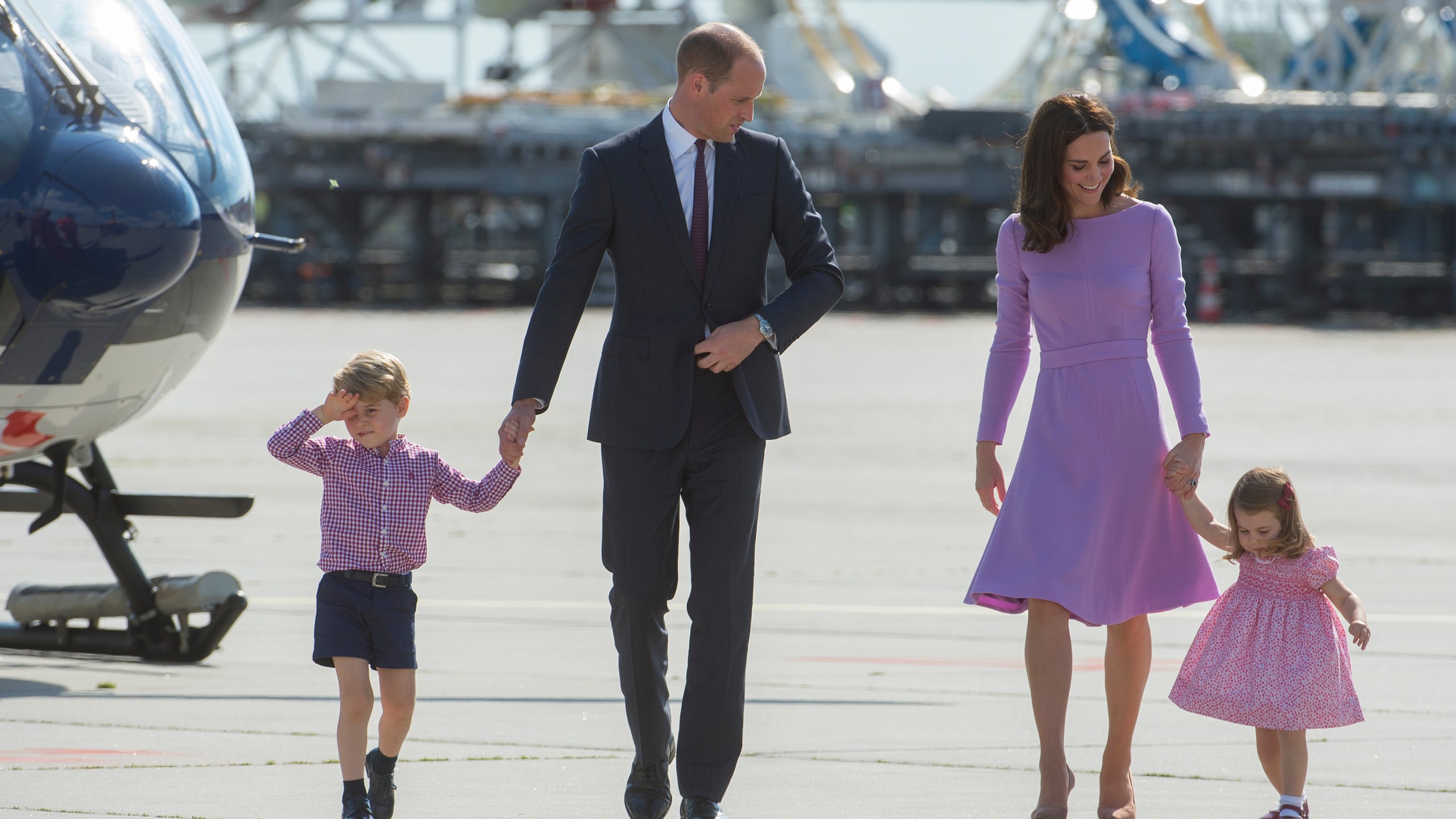 Prince William, Duke of Cambridge, Prince George of Cambridge, Princess Charlotte of Cambridge and Catherine, Duchess of Cambridge depart from Hamburg airport on the last day of their official visit to Poland and Germany on July 21, 2017. (Credit: Julian Simmonds - Pool/Getty Images)