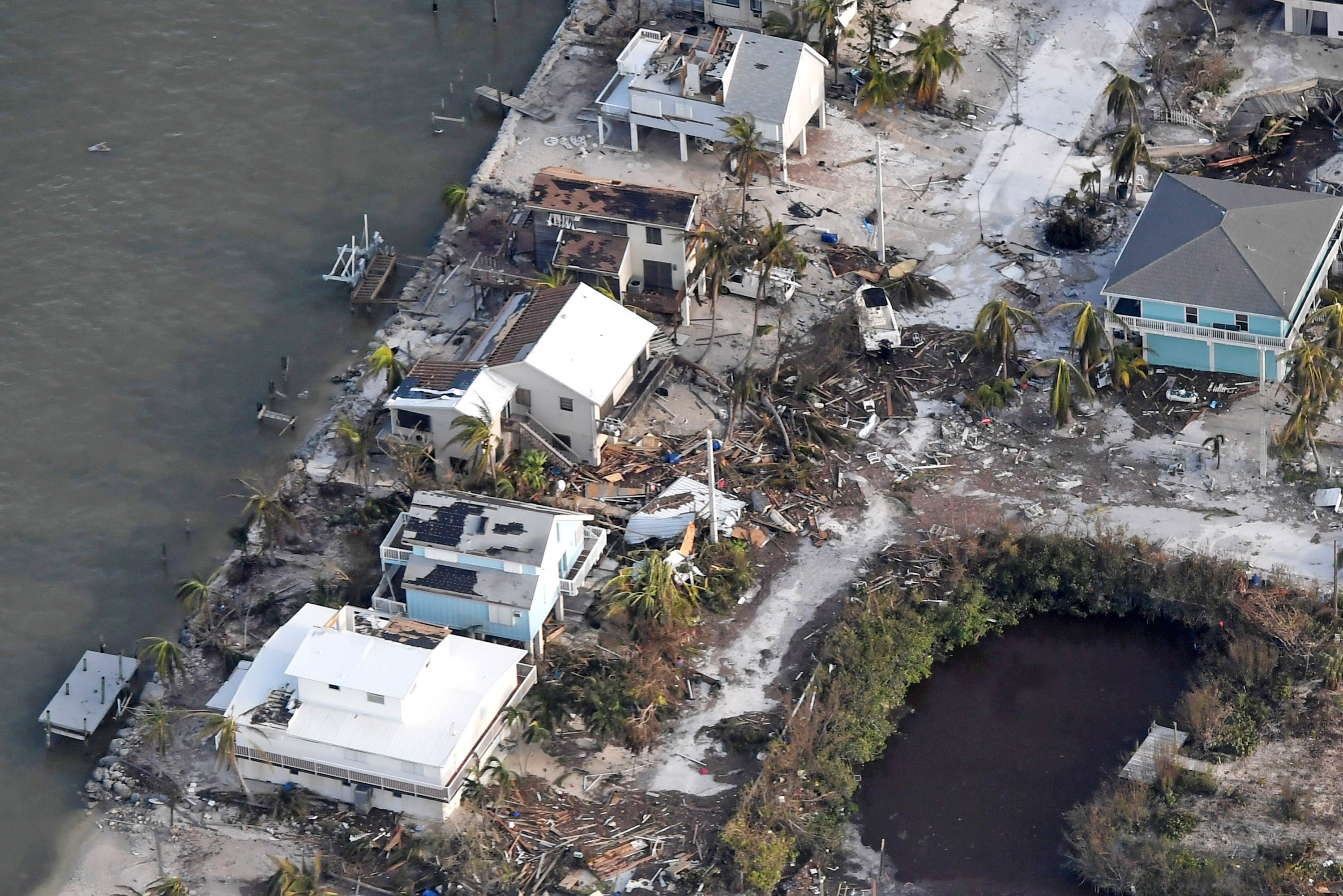 Damaged houses are seen in the aftermath of Hurricane Irma on September 11, 2017 over the Florida Keys, Florida (Credit: Matt McClain -Pool/Getty Images)