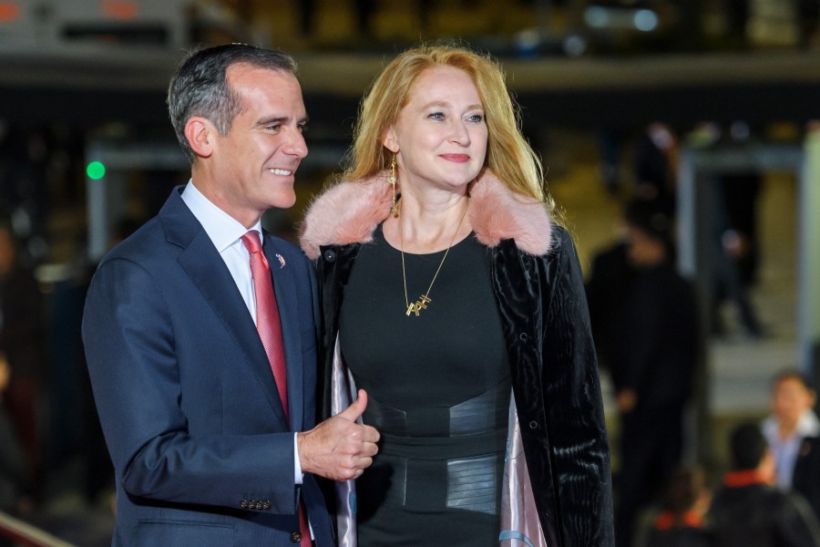 Los Angeles Mayor Eric Garcetti and his wife, Amy Elaine Wakeland, arrive at the opening ceremony of the 131st International Olympic Committee Session on September 12, 2017, in Lima, Peru. (Fabrice Coffrini/AFP/Getty Images)