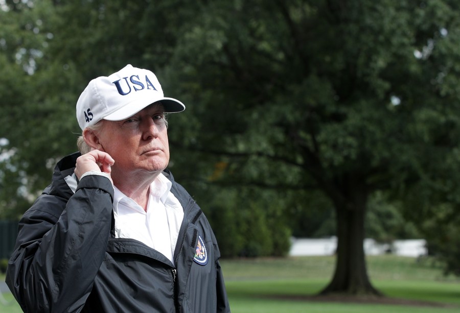 President Donald Trump listens to a question from a member of the media after he returned to the White House from Florida on Sept. 14, 2017. (Credit: Alex Wong / Getty Images)