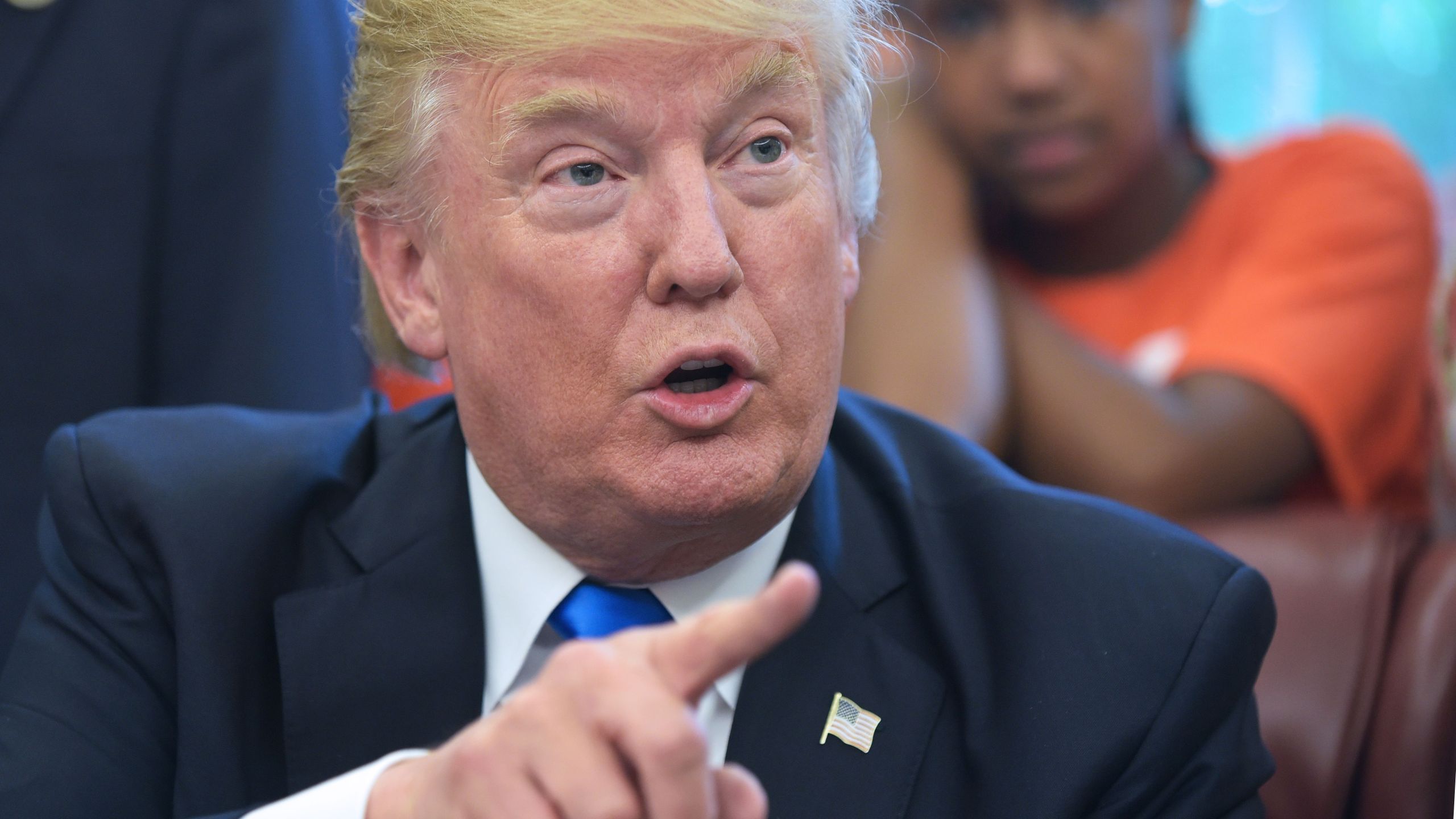 US President Donald Trump speaks before signing a memorandum on increasing access to science, technology, engineering and mathematics education in the Oval Office of the White House on September 25, 2017 in Washington, DC. (Credit: MANDEL NGAN/AFP/Getty Images)