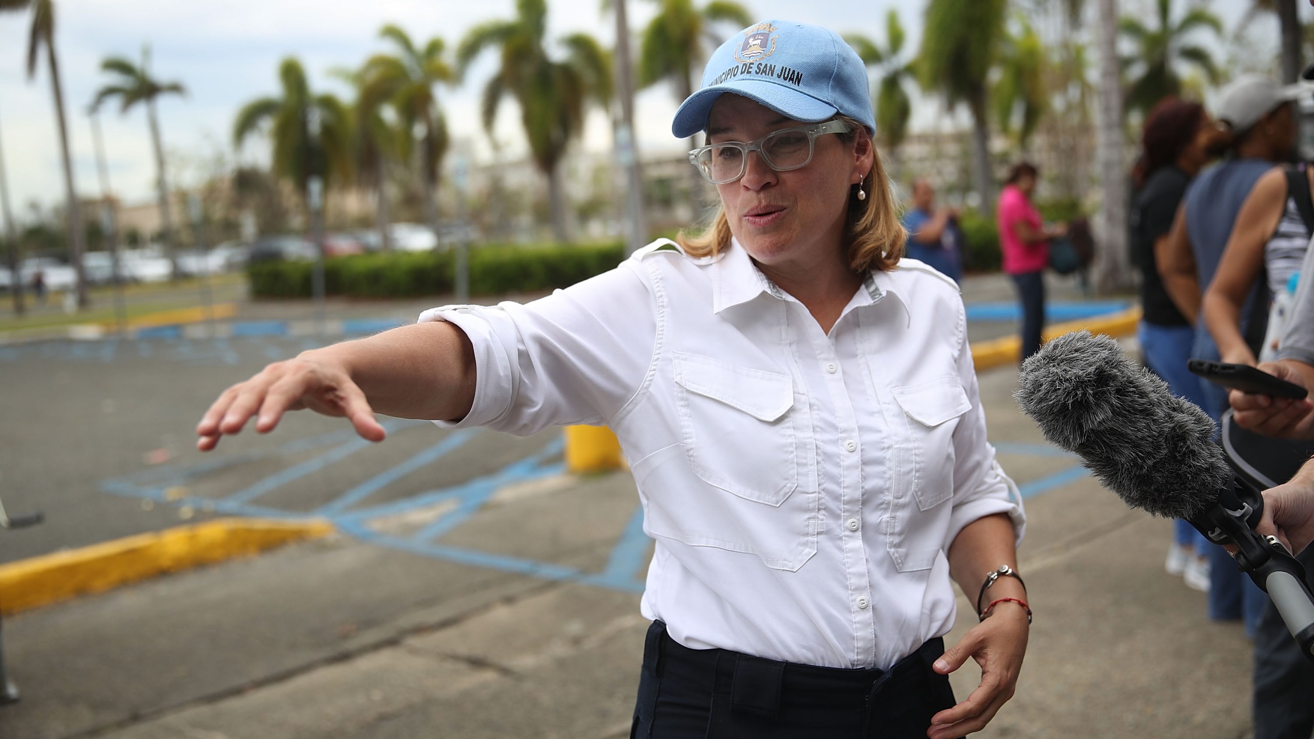 San Juan Mayor Carmen Yulin Cruz speaks to the media as she arrives at the temporary government center setup at the Roberto Clemente stadium in the aftermath of Hurricane Maria on September 30, 2017. (Credit: Joe Raedle/Getty Images)