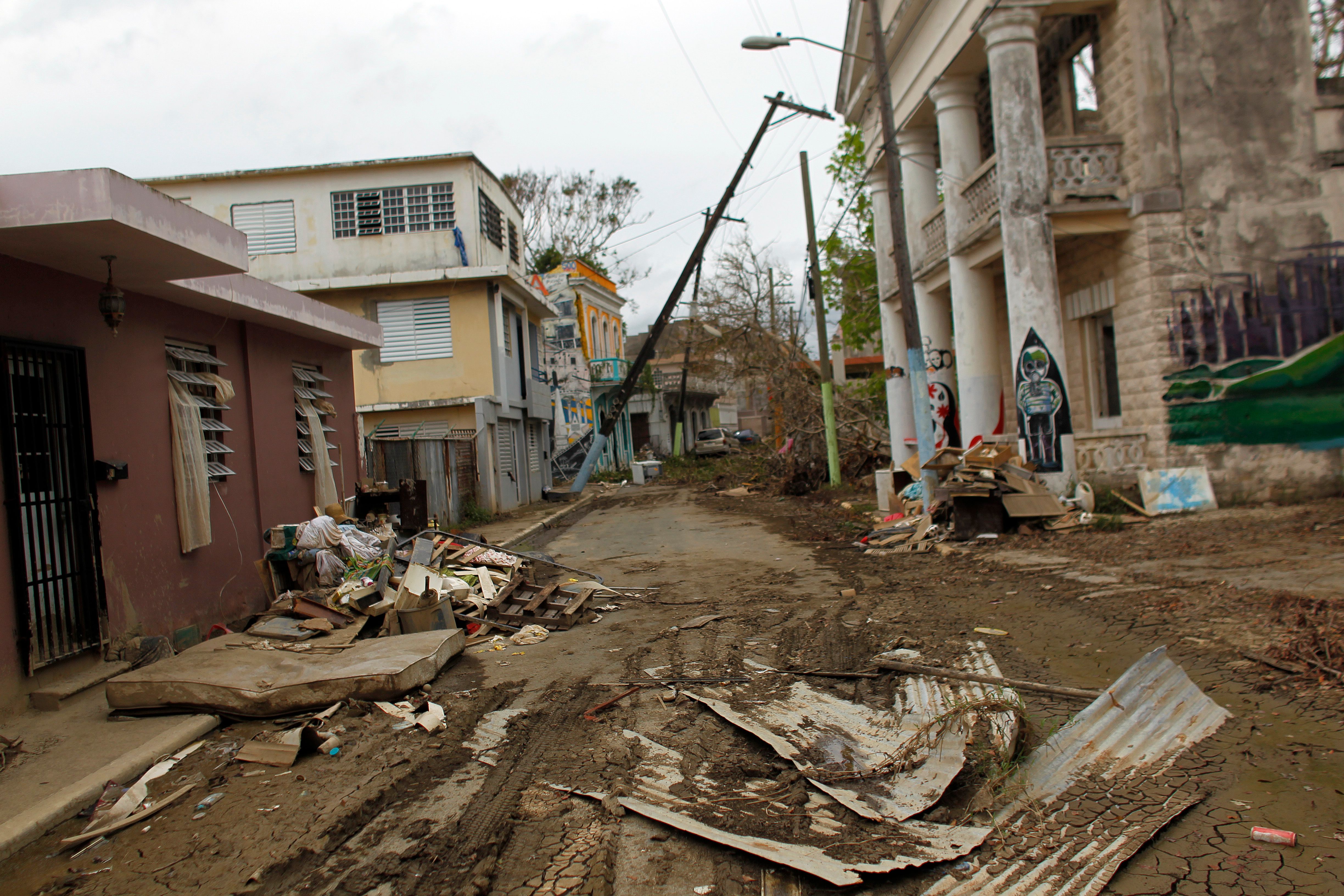 A street is left covered in debris in the aftermath of Hurricane Maria, in Arecibo, Puerto Rico, on Sept. 30, 2017.(Credit: Ricardo Arduengo/AFP/Getty Images)