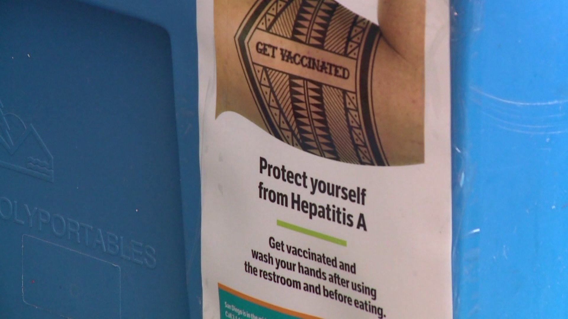 A public health announcement urging residents to vaccinate themselves is seen in San Diego amid a worsening hepatitis A outbreak in the county. (Credit: KSWB)