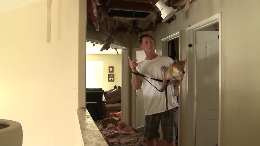 Residents assess damage from the Canyon Fire on Sept. 26, 2017. (Credit: KTLA)