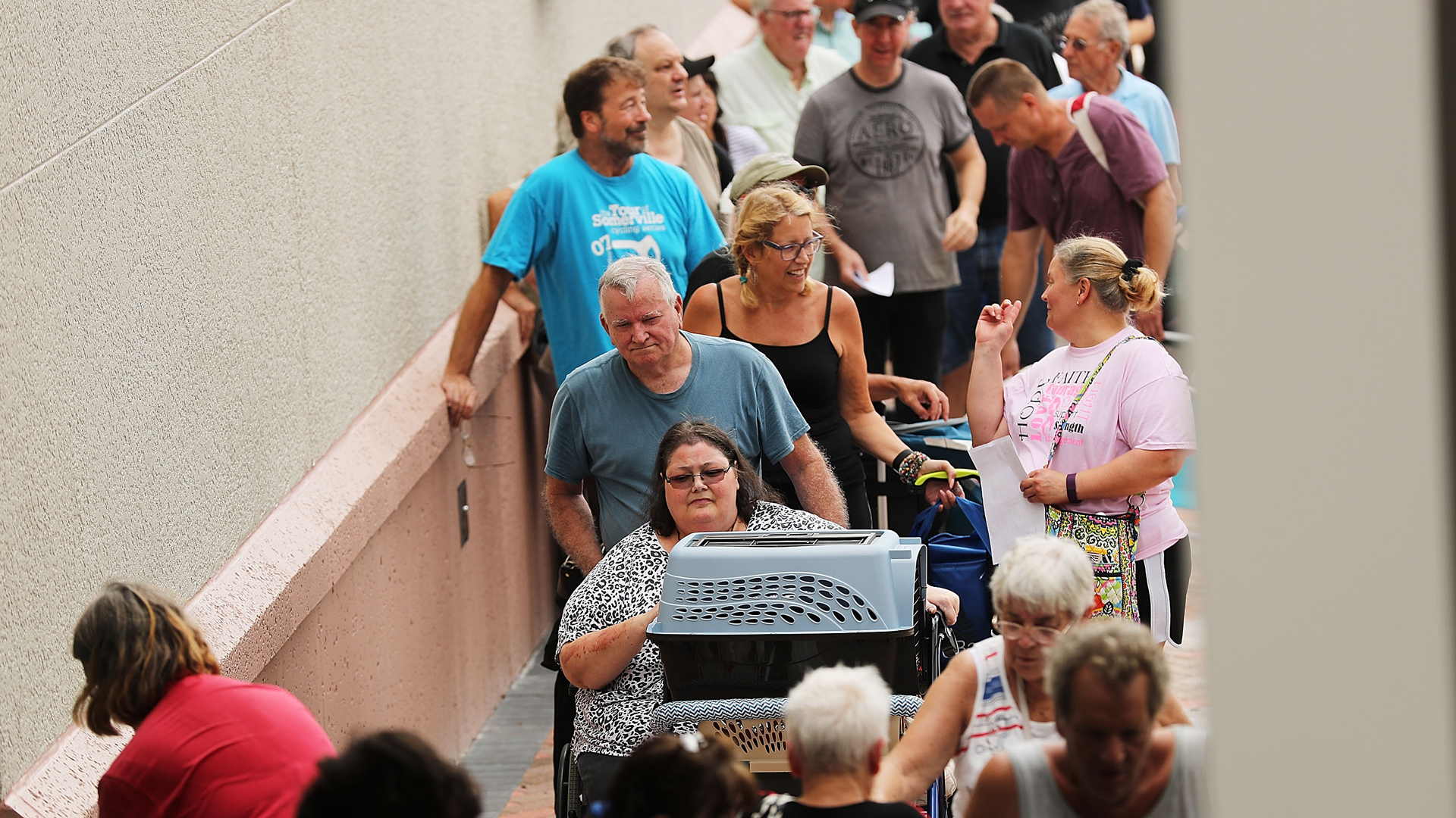 People arrive at a shelter at Alico Arena in Fort Myers, Florida where thousands are hoping to ride out Hurricane Irma, on Sept. 9, 2017. (Credit: Spencer Platt/Getty Images)