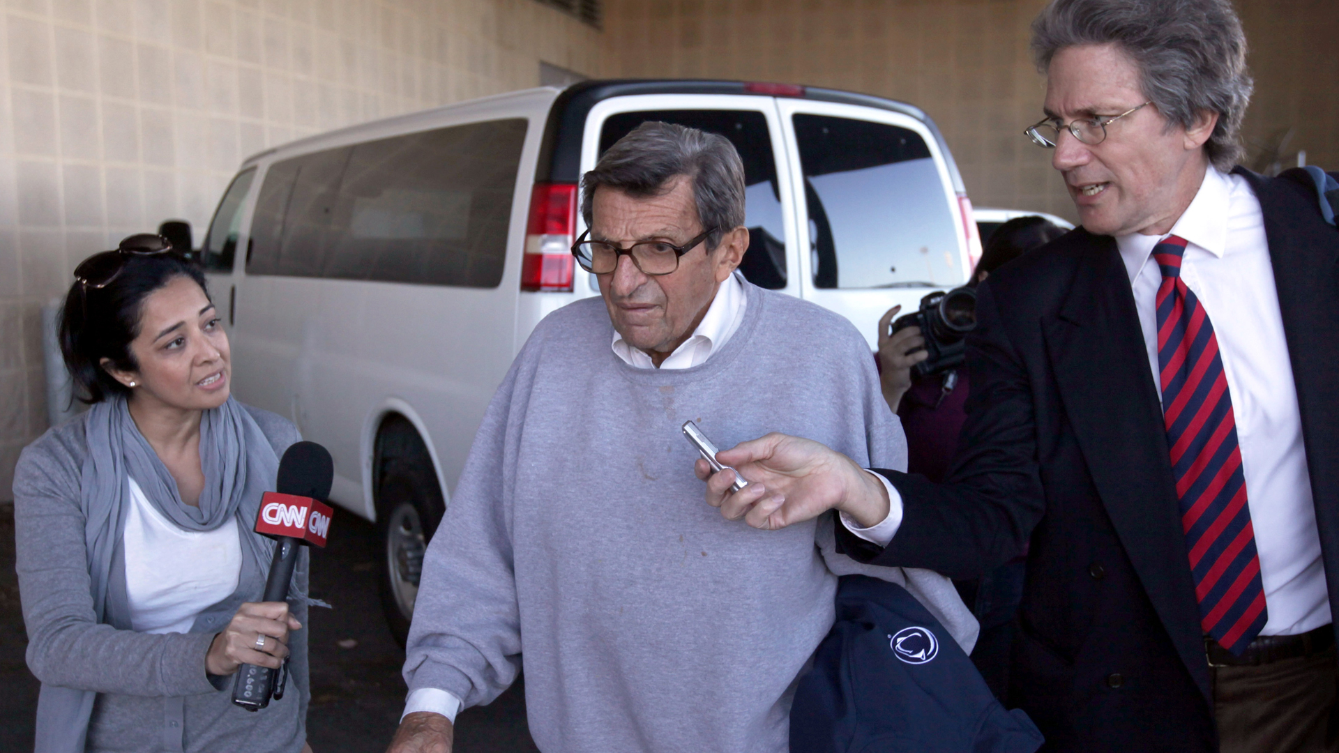 Joe Paterno is surrounded by the media while leaving Penn State University's football building on Nov. 8, 2011 in University Park, Penn. (Credit: Rob Carr/Getty Images)