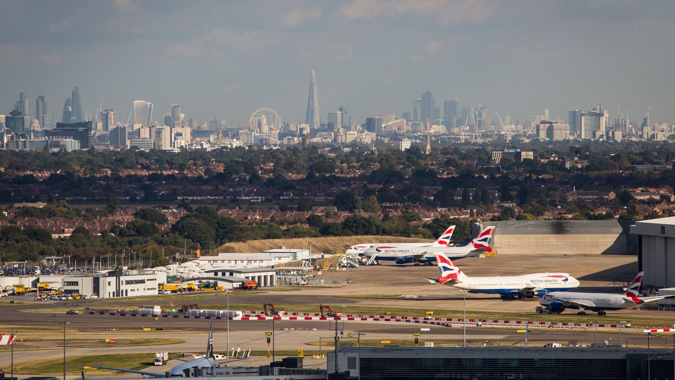 A general view of aircraft at Heathrow Airport in front of the London skyline on Oct. 11, 2016. (Credit: Jack Taylor / Getty Images)