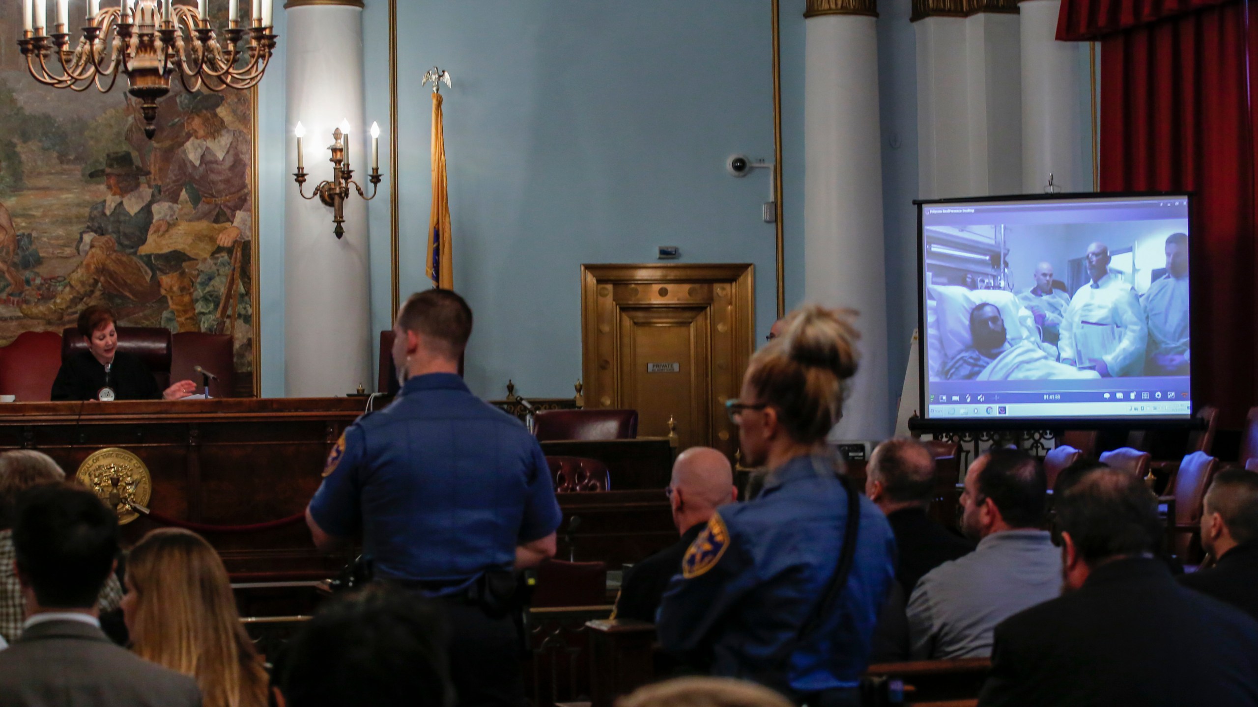 Suspected bomber Ahmad Khan Rahami attends the first court hearing on screen in Elizabeth, New Jersey while he remains in University Hospital in Newark, on October 13, 2016. (Credit Kena Betancur/AFP/Getty Images)