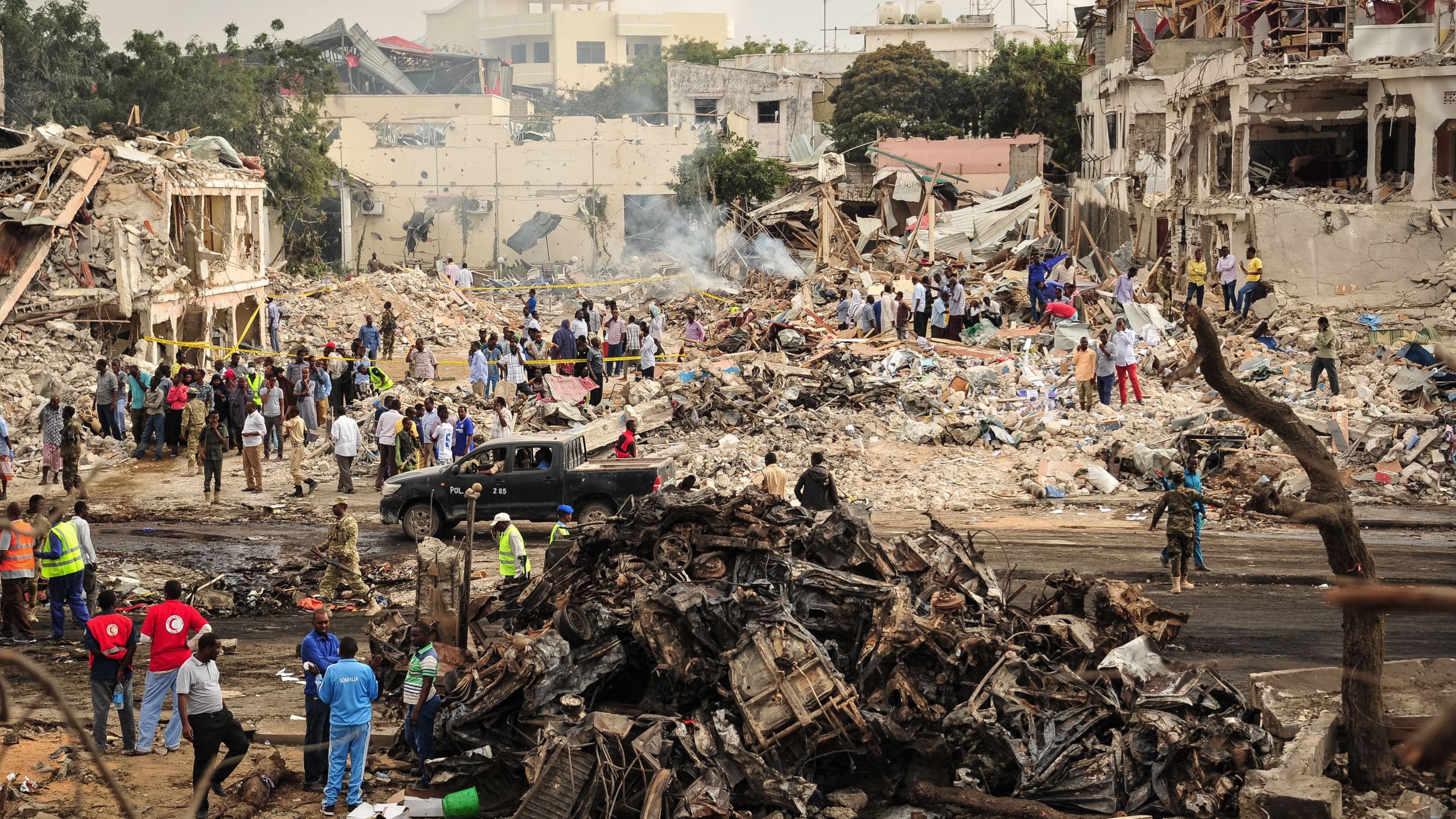 A picture taken on October 15, 2017 shows a general view of the scene of the explosion of a truck bomb in the centre of Mogadishu. (Credit: MOHAMED ABDIWAHAB/AFP/Getty Images)