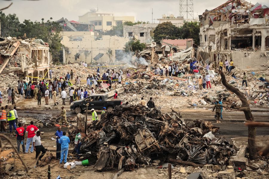 A picture taken on October 15, 2017 shows a general view of the scene of the explosion of a truck bomb in the centre of Mogadishu. (Credit: MOHAMED ABDIWAHAB/AFP/Getty Images)