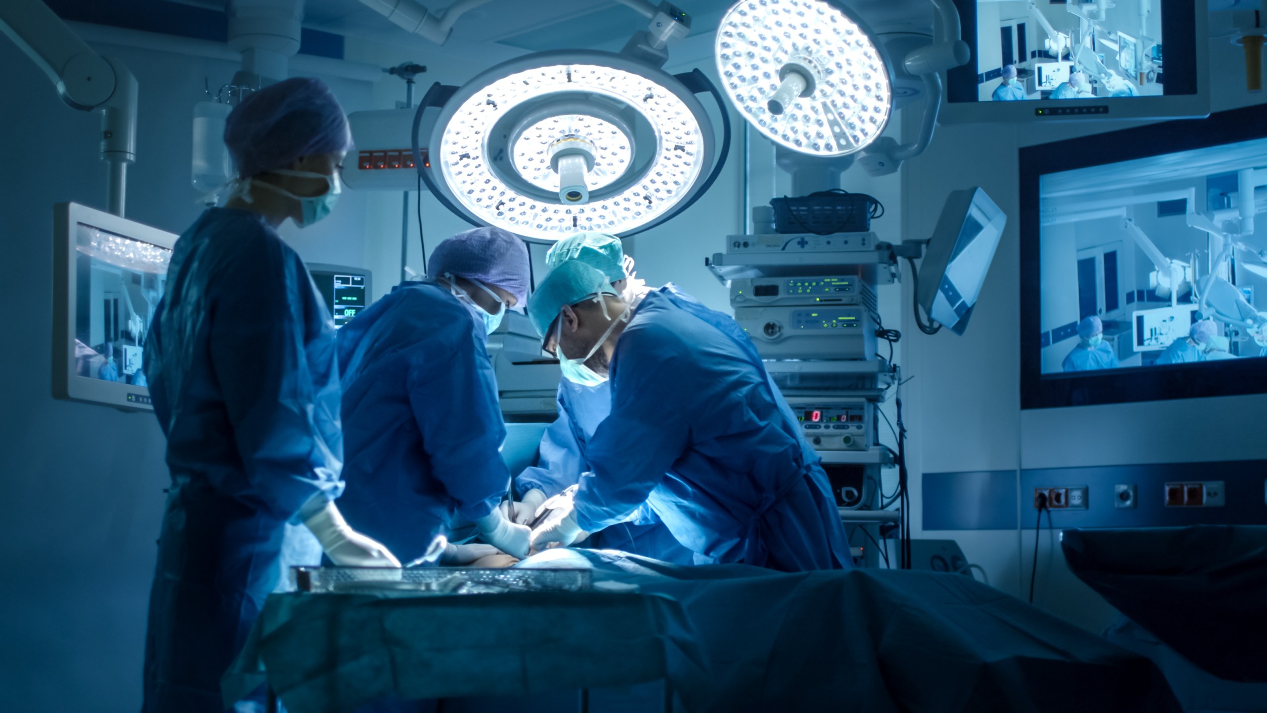 A medical team performing a surgical operation is seen in this file photo. (Credit: iStock/Getty Images Plus)