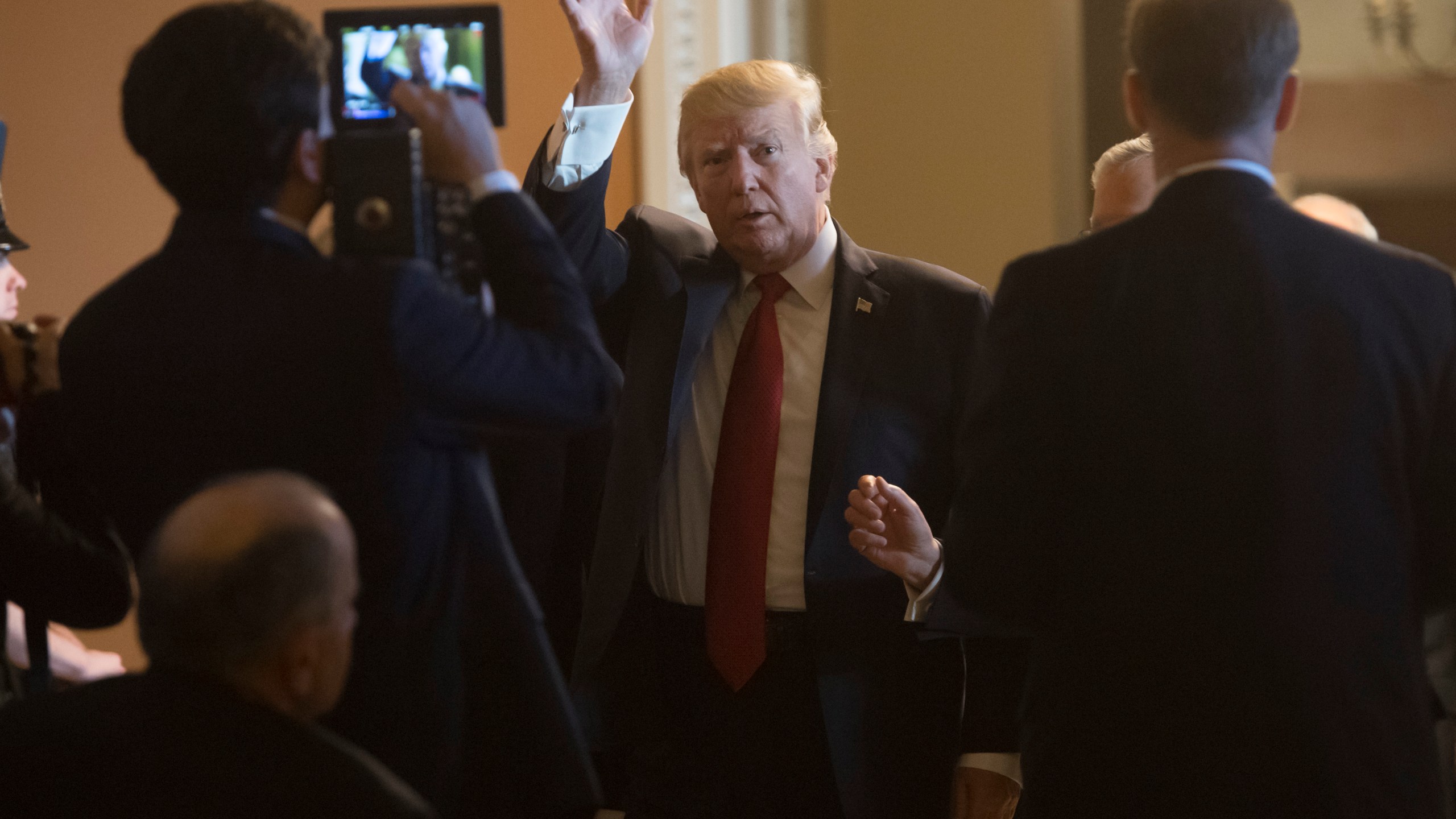 Donald Trump arrives to meet with Republican Senators at the U.S. Capitol on October 24, 2017. (Credit: Saul Loeb/AFP/Getty Images)