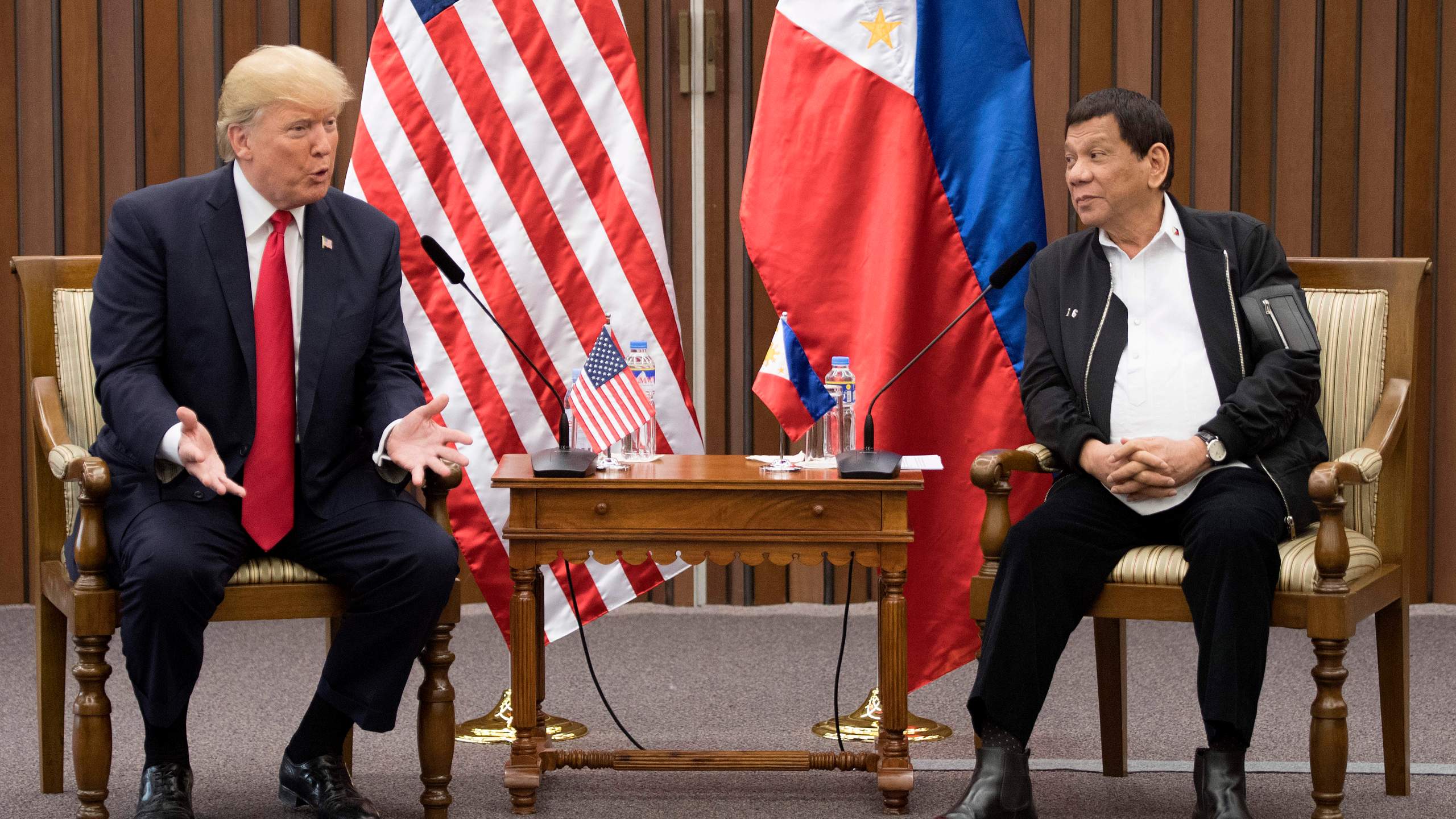 US President Donald Trump talks with Philippine President Rodrigo Duterte during their bilateral meetin on the side line of the 31st Association of South East Asian Nations (ASEAN) Summit in Manila on November 13, 2017. (Credit: JIM WATSON/AFP/Getty Images)