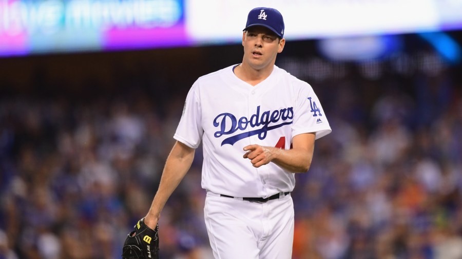 Rich Hill stepped off the mound so the crowd could jeer, made a pitch, stepped off the mound for another round of jeers, made another pitch. He turned into a veritable Pedro Baez, lingering between pitches so the crowd could rev up its vocal cords once again. He is seen in the second inning pitching against the Houston Astros during Game 6 of the 2017 World Series at Dodger Stadium on October 31, 2017 in Los Angeles. (Credit: Harry How/Getty Images)