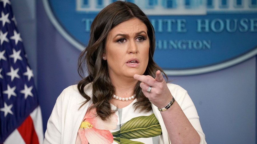 White House Press Secretary Sarah Huckabee Sanders talks with reporters during the daily news conference in the Brady Press Briefing Room at the White House November 27, 2017 in Washington, DC. (Credit: Chip Somodevilla/Getty Images)