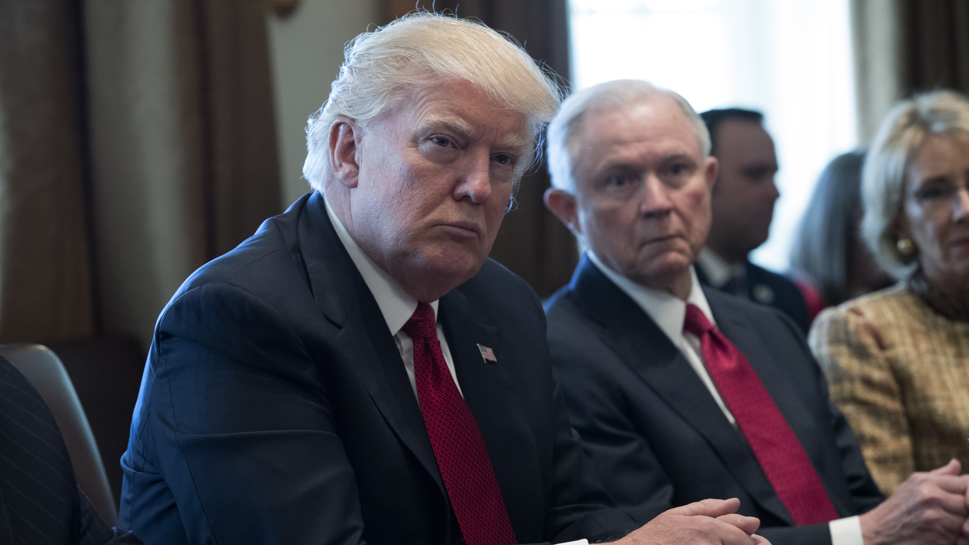 President Donald Trump and Attorney General Jeff Sessions attend a panel discussion on an opioid and drug abuse in the Roosevelt Room of the White House March 29, 2017 in Washington, DC. (Credit: Shawn Thew-Pool/Getty Images)