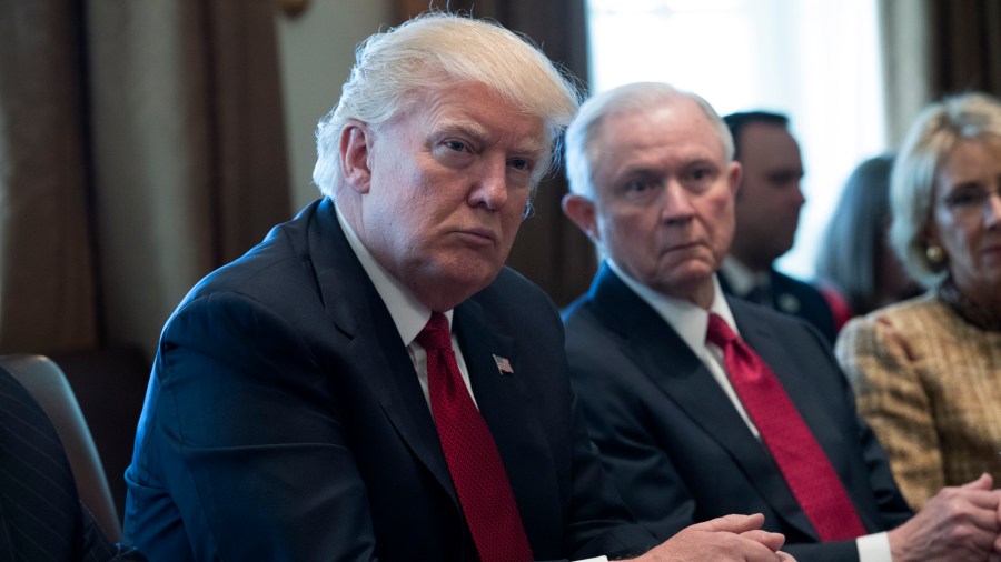 President Donald Trump and Attorney General Jeff Sessions attend a panel discussion on an opioid and drug abuse in the Roosevelt Room of the White House March 29, 2017 in Washington, DC. (Credit: Shawn Thew-Pool/Getty Images)