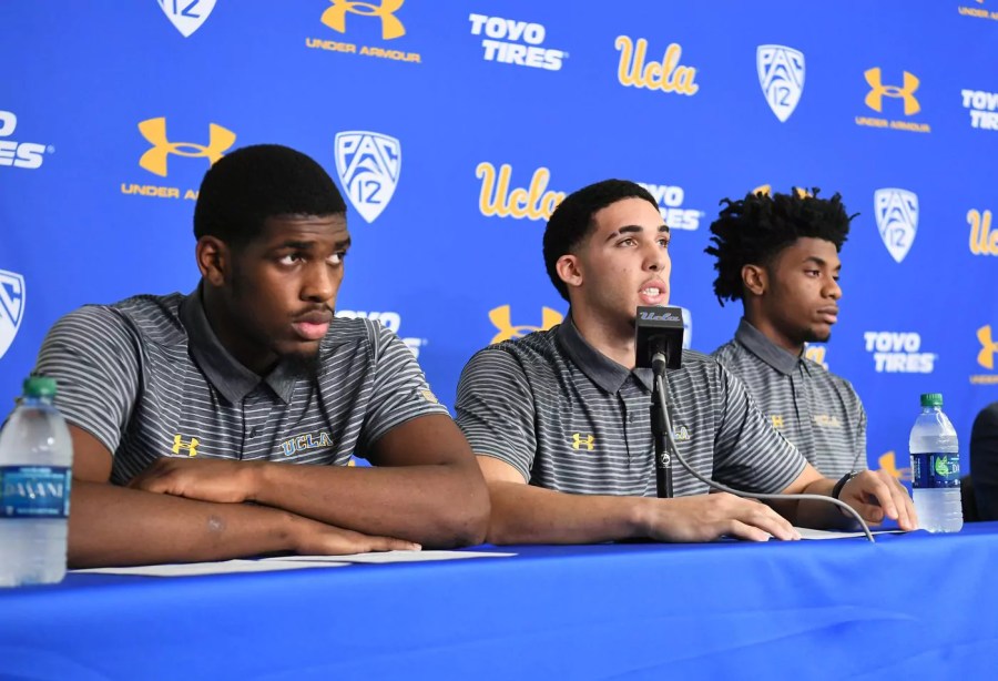 UCLA basketball players Cody Riley, LiAngelo Ball and Jalen Hill give statements at Pauley Pavilion in Los Angeles during a news conference on Nov. 15, 2017. (Credit: Wally Skalij / Los Angeles Times)