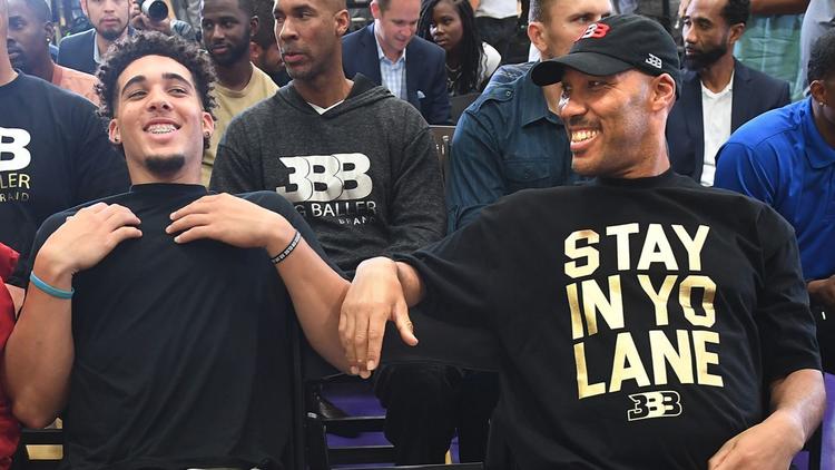 LaVar Ball, right, sits with son LiAngelo after a press conference in El Segundo on June 23, 2017. (Credit: Wally Skalij / Los Angeles Times)